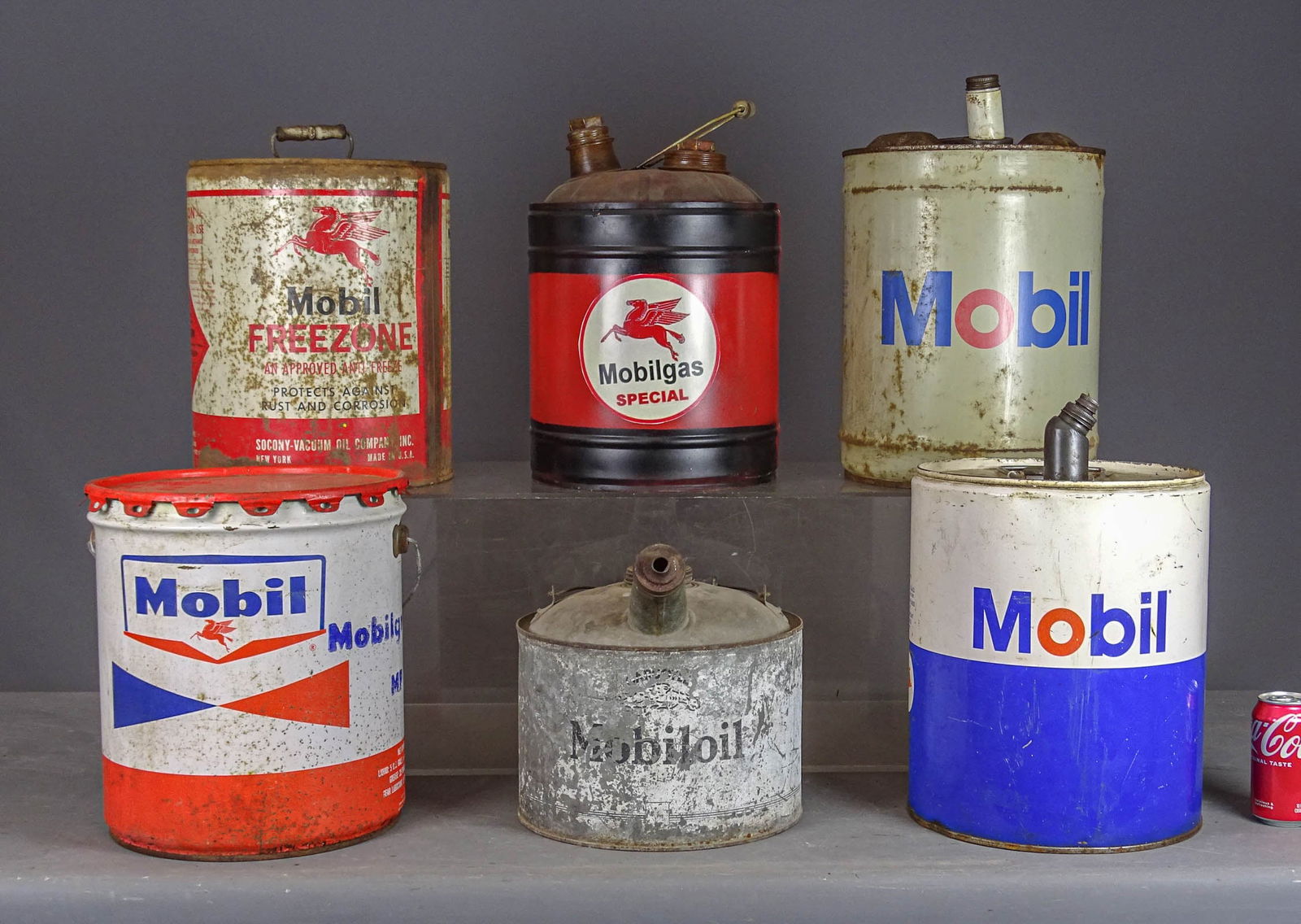 Mobil Oil Tins: Lot (6) Mobil oil tins. Largest 14 1/2" Ht.. Meltz Collection, Columbia County New York.