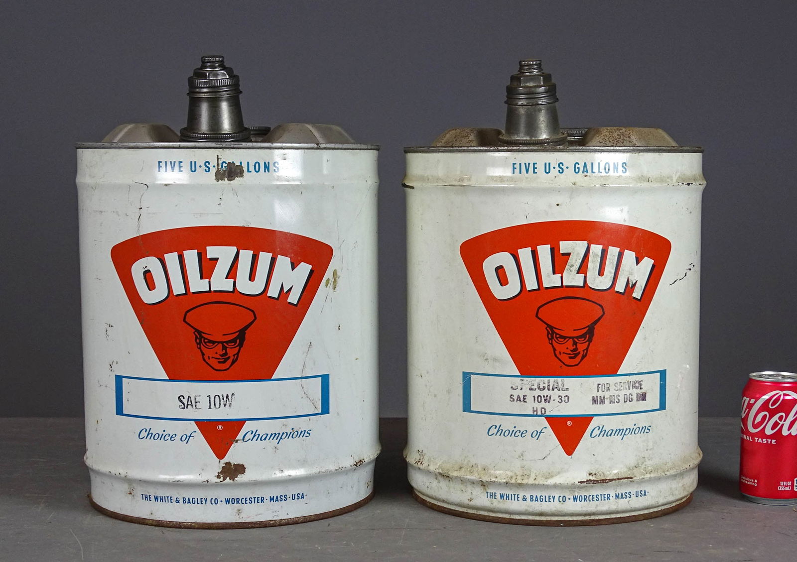 Oilzum Oil Tins: Two Oilzum oil tins. 14 1/2" Ht. Meltz Collection, Columbia County New York.