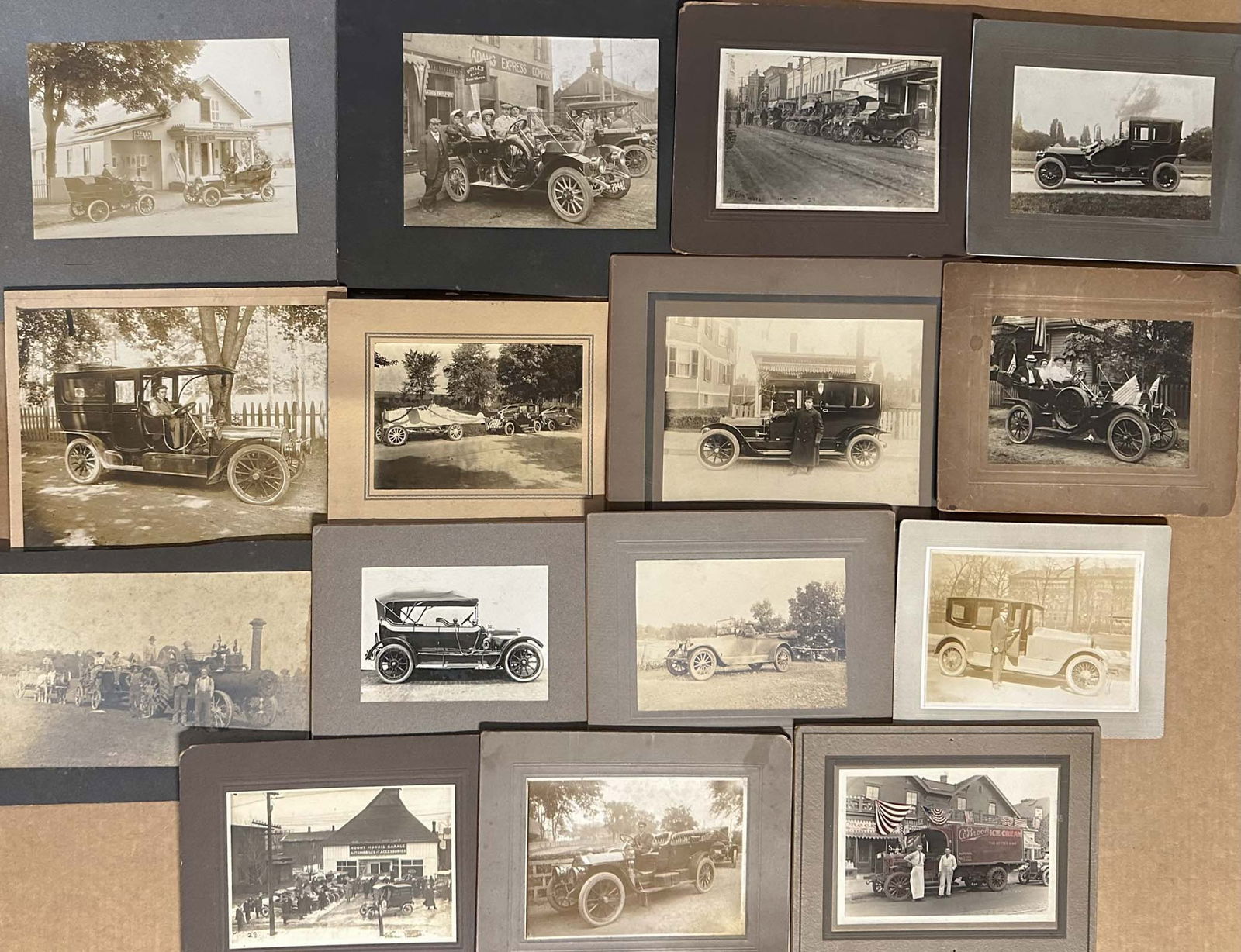 Automobile Photographs: Fifteen card mounted period photos of autos, etc from 1900 - 1920, sizes range from 14 x 12 to 10 x 8.