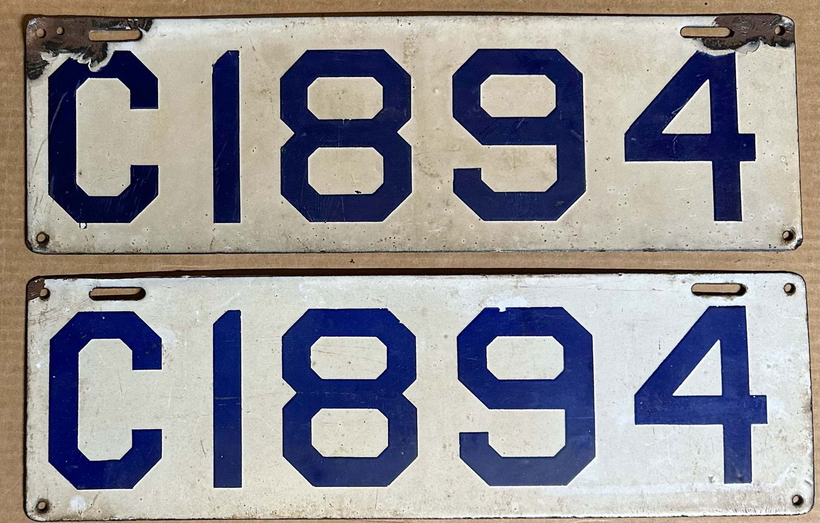 License Plates: Pair of Conn 1911 porcelain license plates, “C1894”, 18 long x 5.5 wide, was registered to Mary Longworth, Middletown, CT.