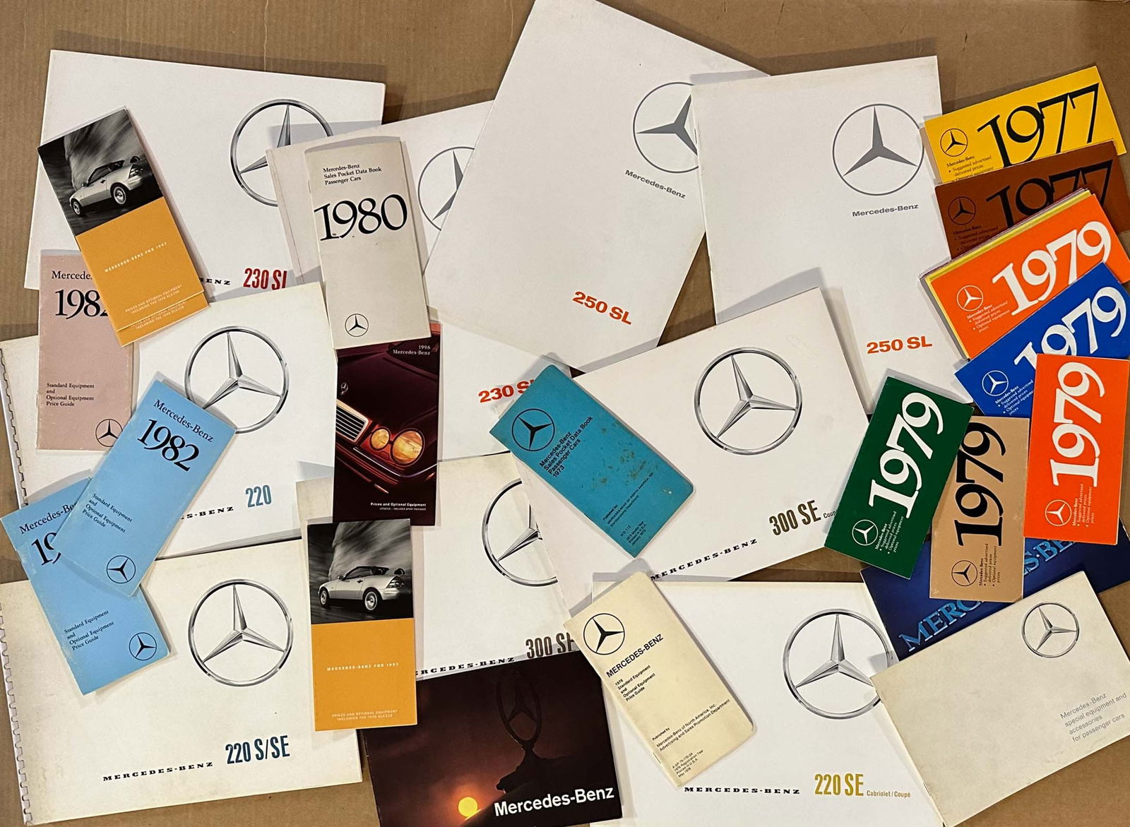 Mercedes sales brochures: Two heavy boxes of Mercedes sales brochures, 1960's and later, sample shown, total weight 40 (+) pounds, vg condition