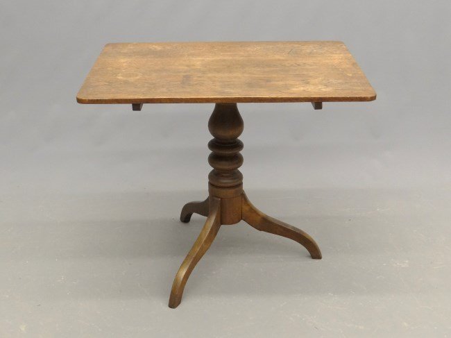 19th c. Tilt Top Table: 19th c. tilt top turned base tea table. Top 24 3/4" x 33", 28" Ht.