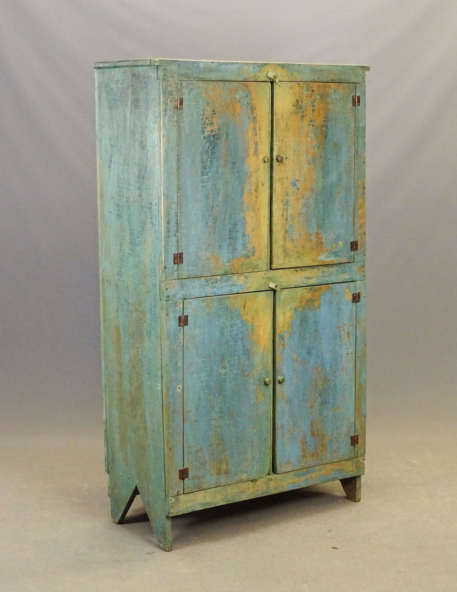 19th c. Four Door Wall Cupboard: 19th c. four door wall cupboard in old blue paint. Bootjack cutout base. 38" x 17 1/2" x 68" Ht..
