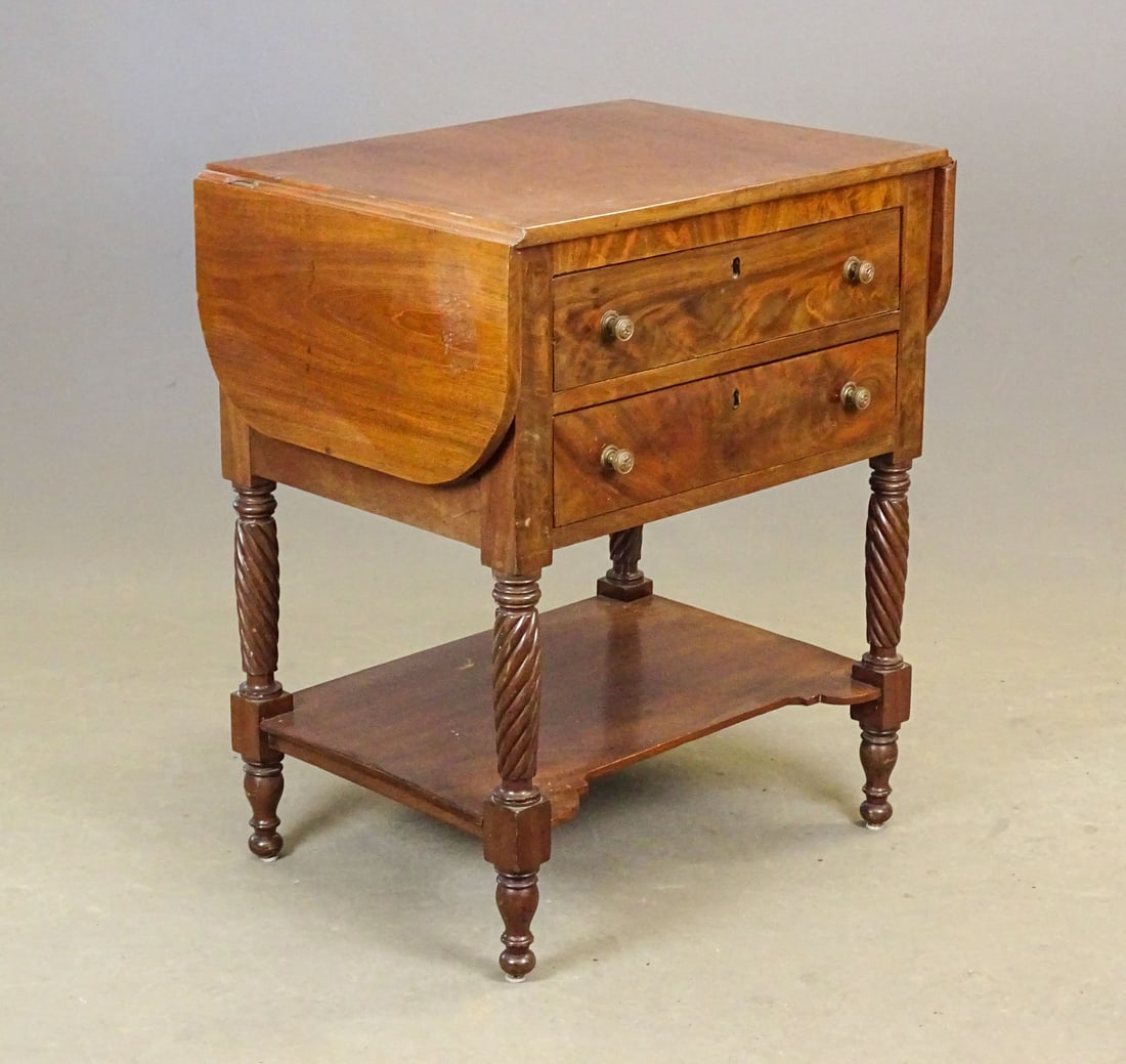 19th c. Mahogany Stand: 19th c. Federal mahogany two drawer work stand with twisted legs and undershelf. 24 1/2" x 18 1/2" with 10" leaves, 31" Ht..