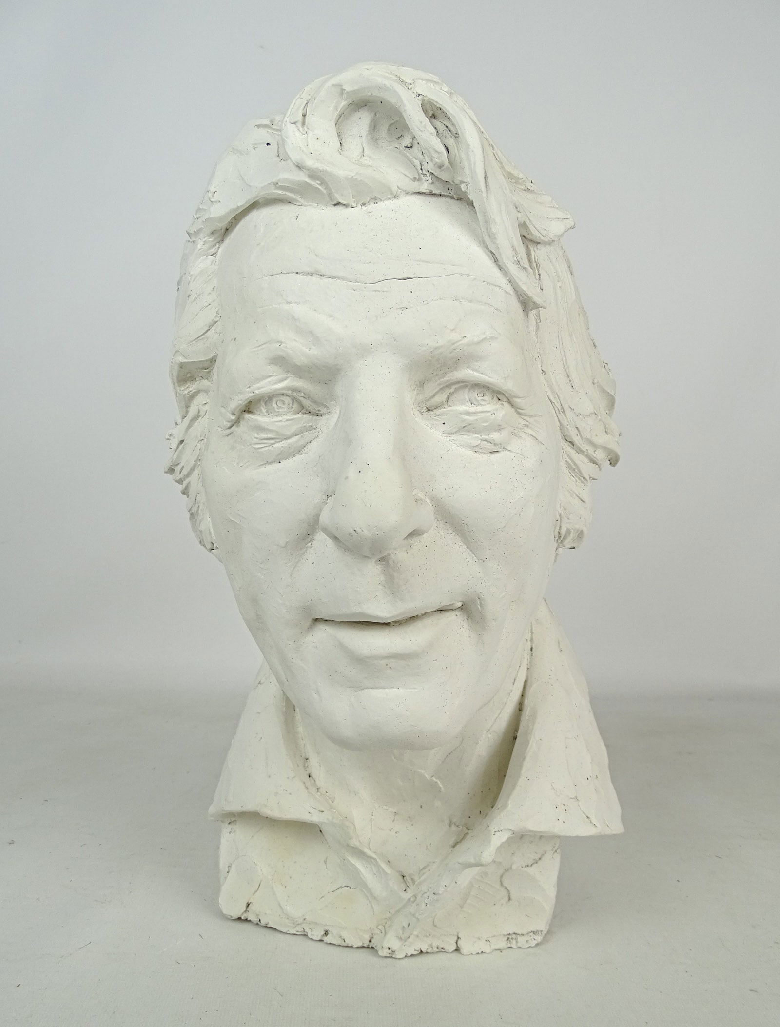 Neil Estern (1926-2019): Neil Estern (1926-2019), Danny Kaye, white plaster. For the Brooklyn Museum. 15" Ht., 6" W.. Provenance: Family of the artist.