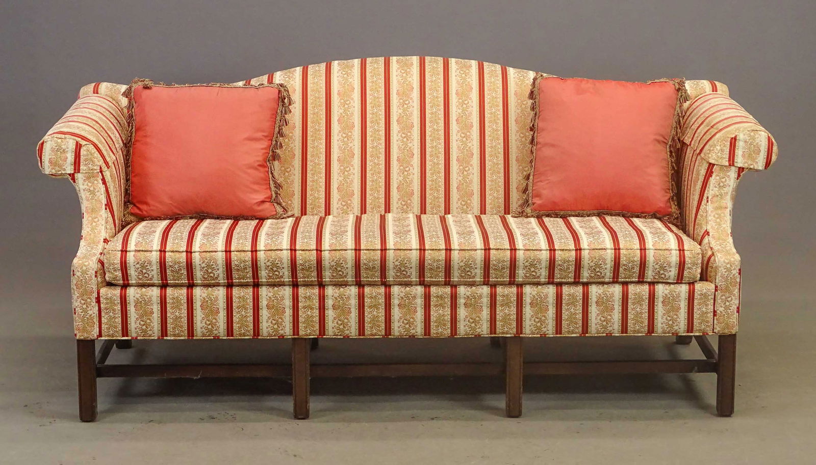 Chippendale Sofa: Chippendale style mahogany base sofa. High quality upholstery., 79" x 32" x 35" Ht..