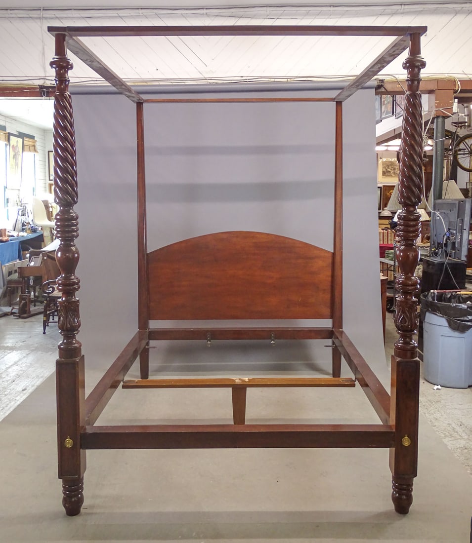 Mahogany Four Poster Bed: 20th Century carved mahogany four poster bed. Twisted columns. 69" W., 89" D., 93 1/2" Ht..