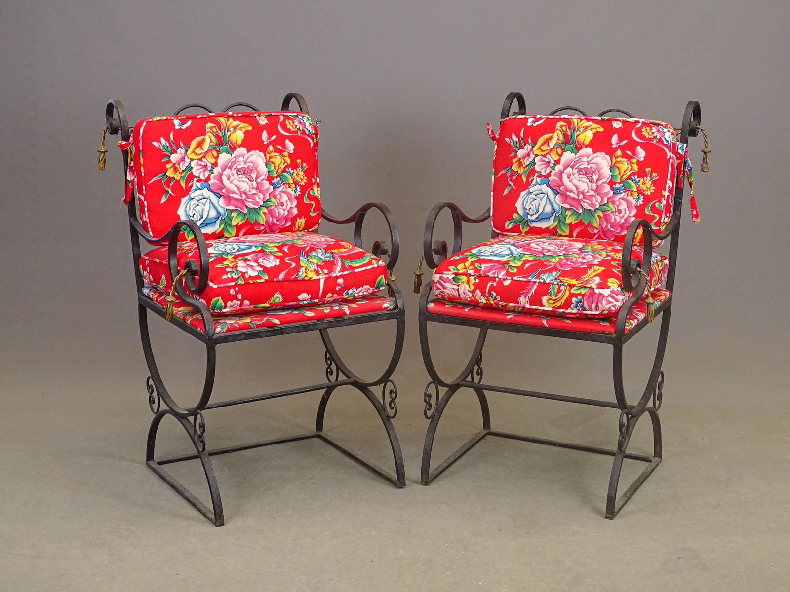 Pair Wrought Iron Chairs: Pair of high quality wrought iron chairs with cushions. 20" x 25" x 36" Ht.. Note tassel design.