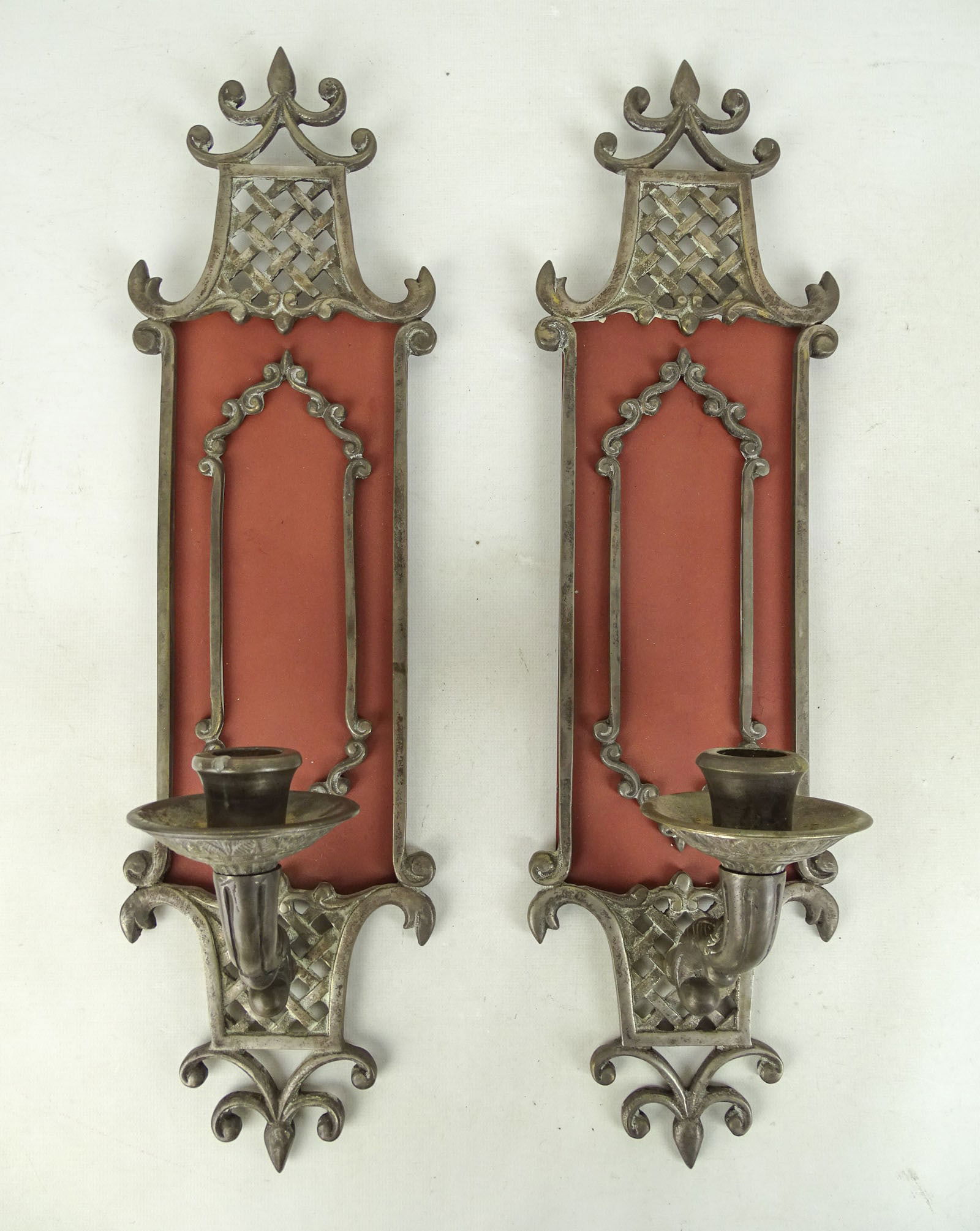 Pair of Iron Candle Sconces: Pair of iron candle sconces. 18" L., 4" W..