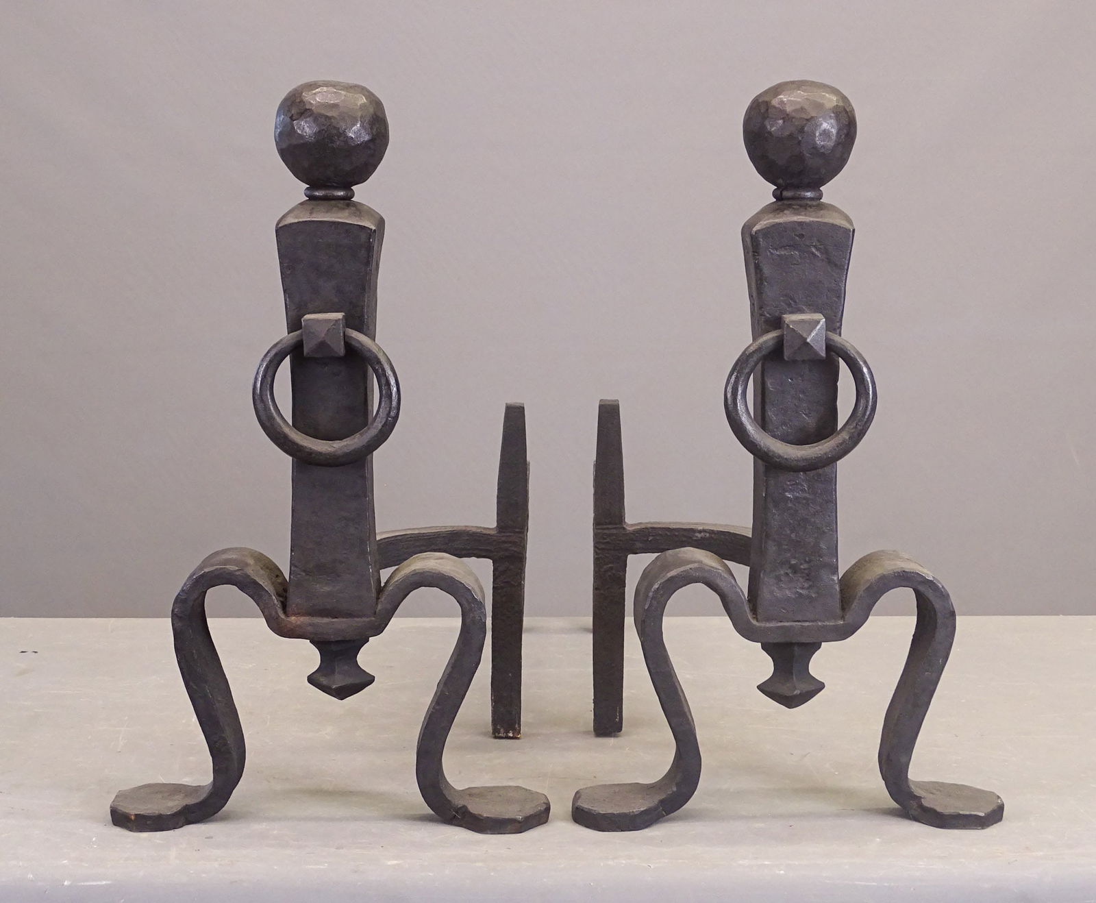 Pair Arts & Crafts Period Andirons: Pair of Arts and Crafts style iron andirons. In the style of Gustave Stickley #88, Eastwood N.Y. 21" Ht., 25" D..