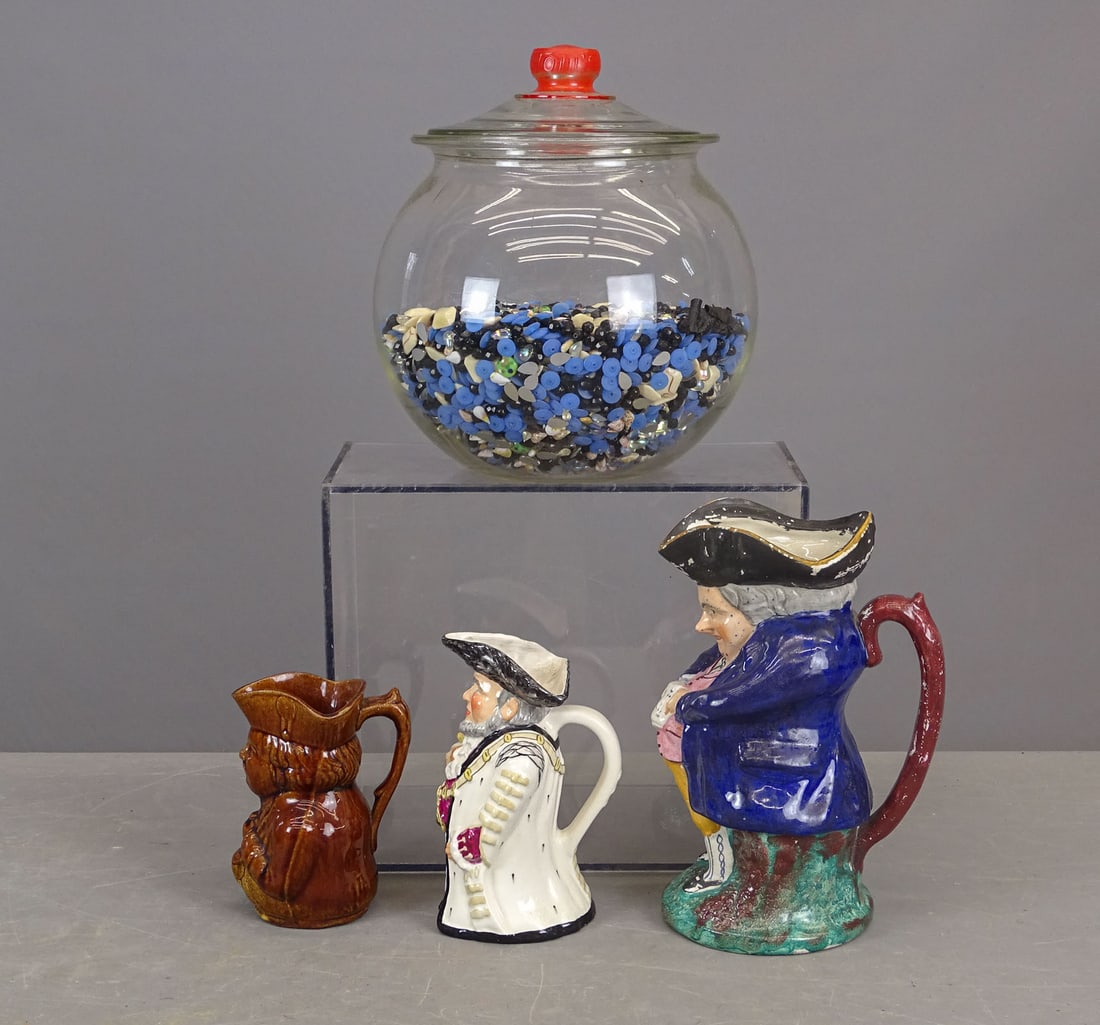 Tom's Peanut Jar Lot: C. 1930's Tom's Peanut jar with an accumulation of modern beads together with three Toby mug (one very early).