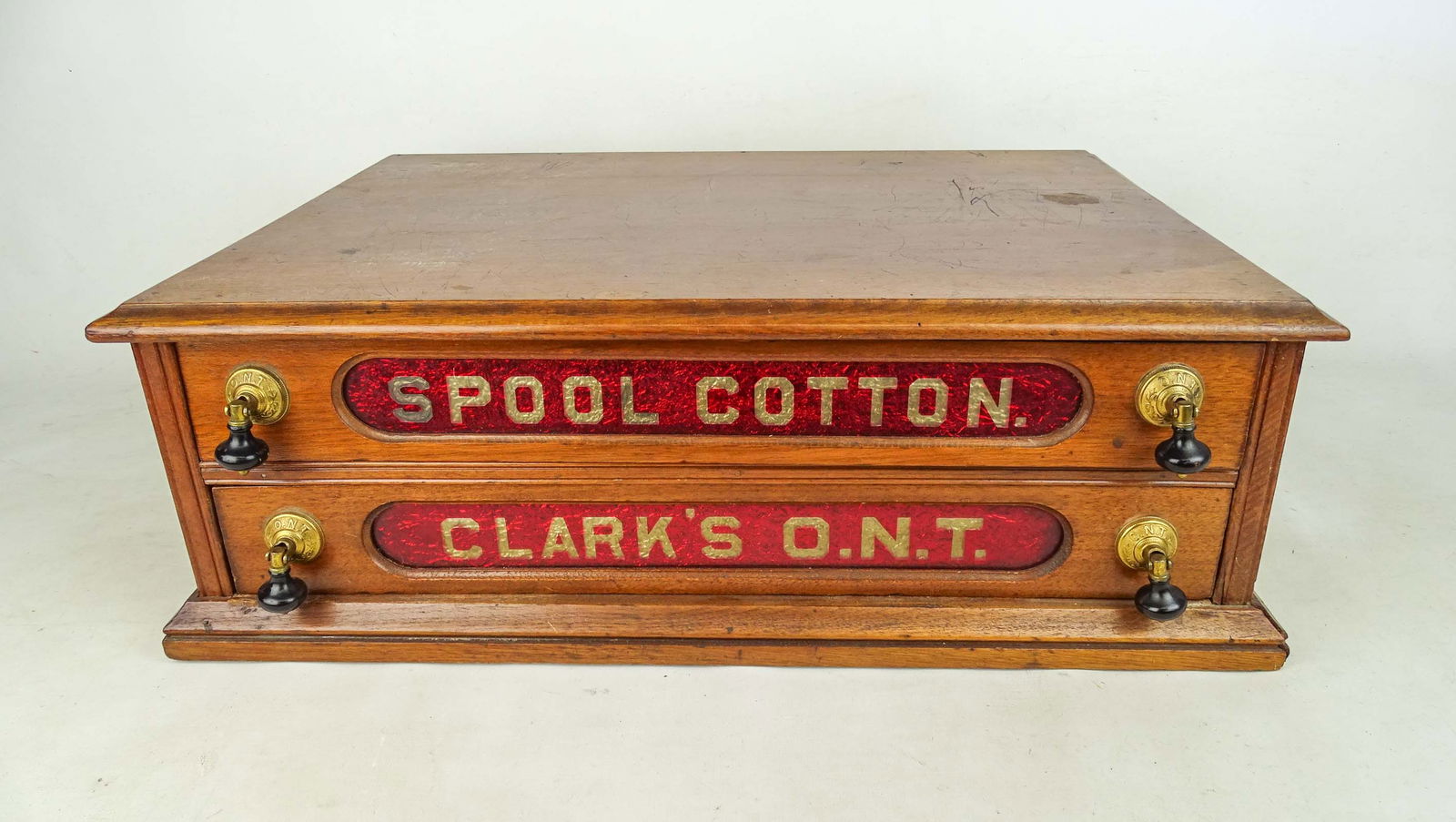 Antique Spool Cabinet: Antique Clarks Spool cabinet. 22" x 16" x 7 1/2".