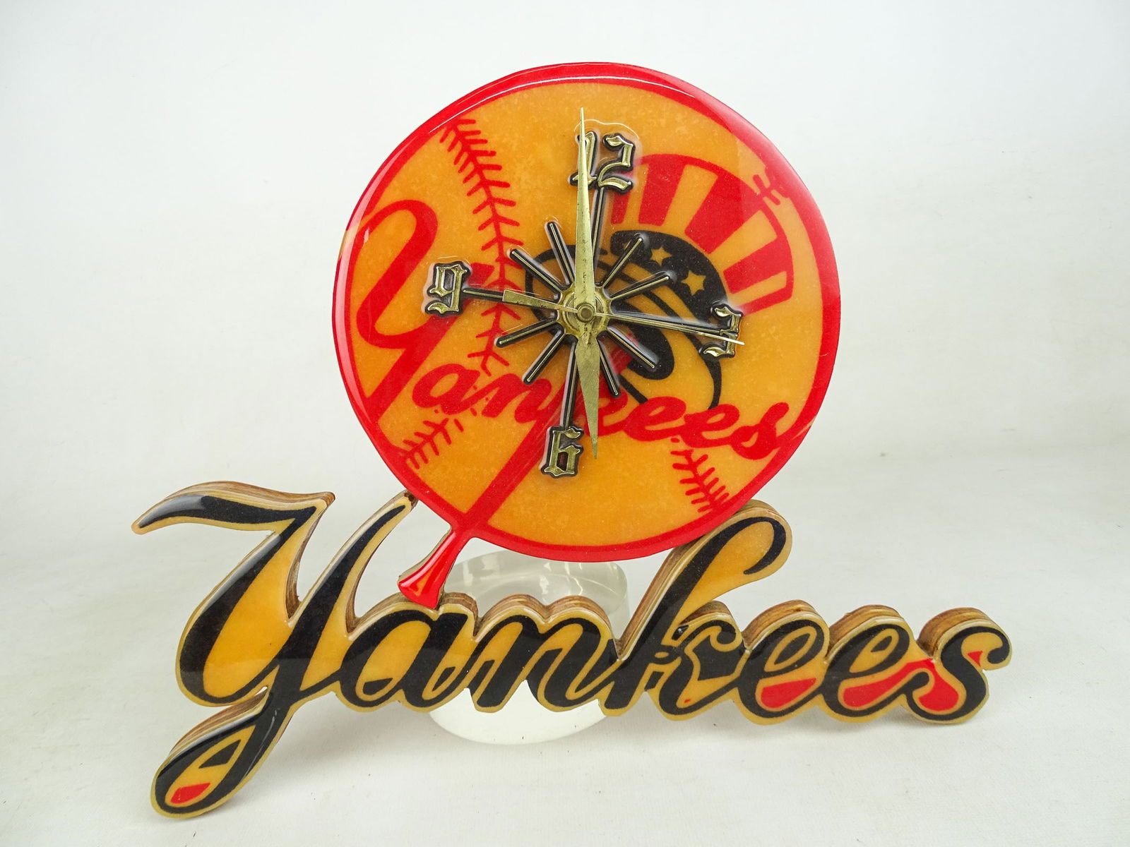 Vintage Yankees Clock: Vintage wood and resin "YANKEES" clock. 13 1/2" x 14".