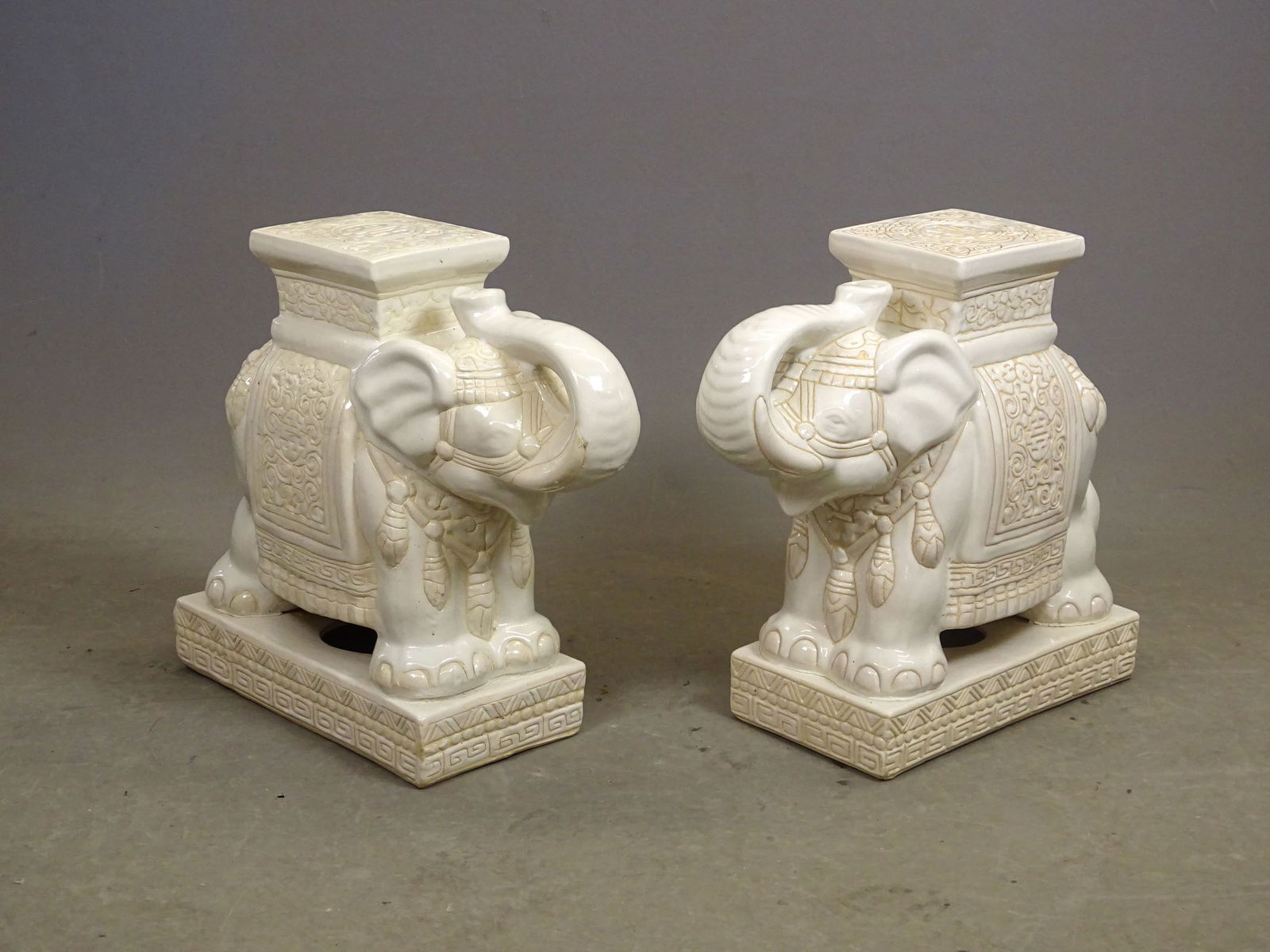 Pair Ceramic Garden Seats: Pair ceramic elephant garden seats. 22" x 8" x 20" Ht.. One small chip.