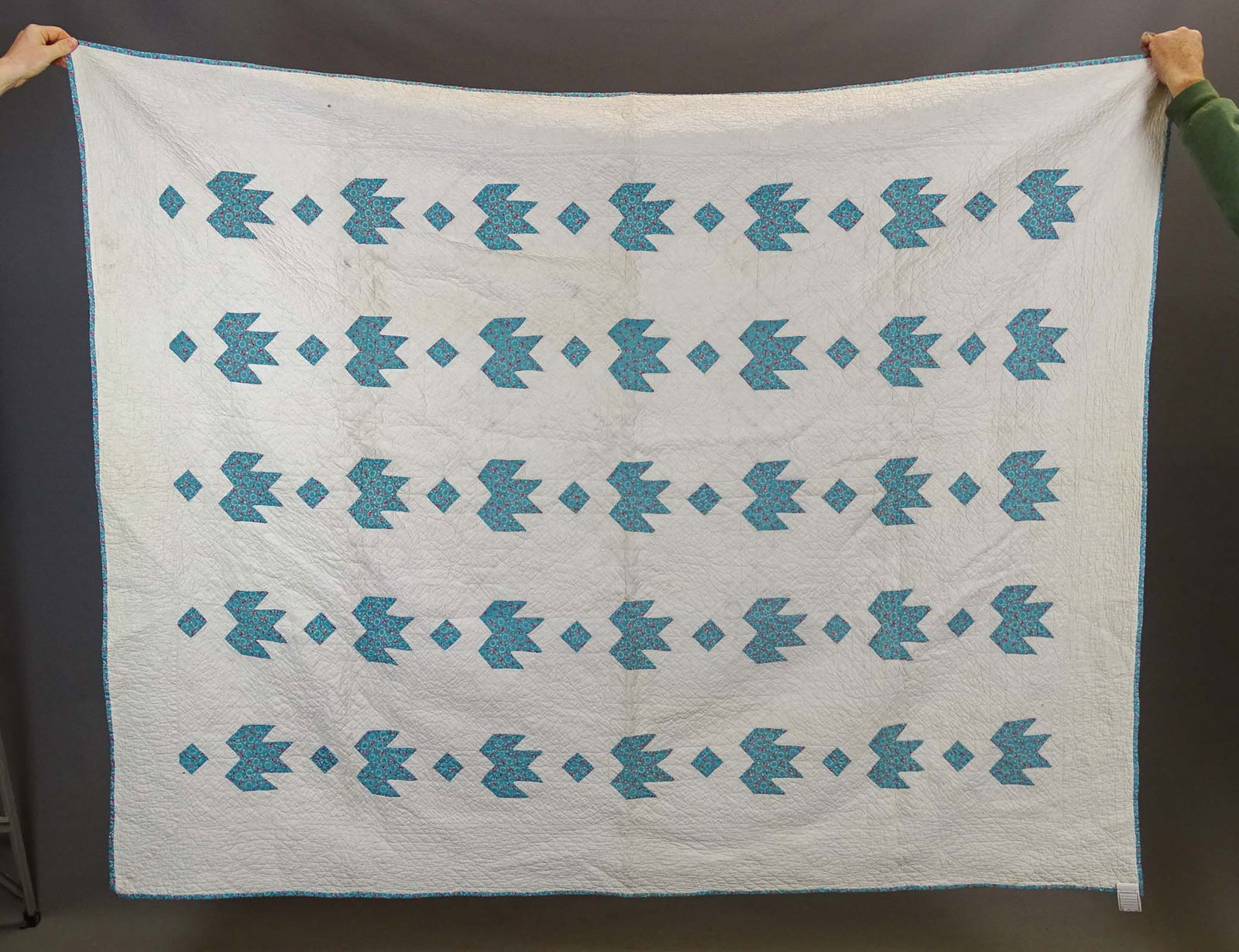 Quilt Lot: Lot (2) quilts including: C. 1890 Indigo and pink on white Bears Paw (58" x 72"), C. 1890 blue and white Irish Chain (68" x 80").