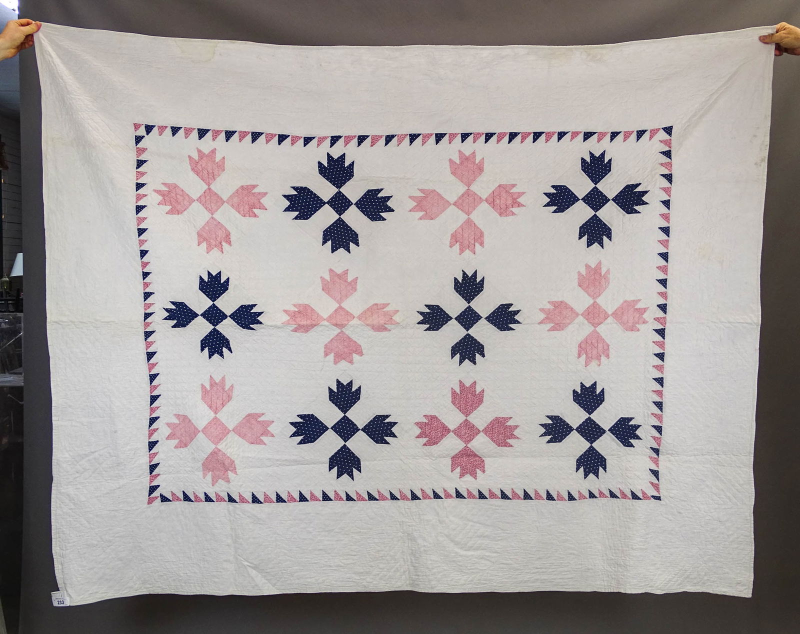 C. 1890 Bear Paws Quilt: C. 1890's Indigo and White Bear Paws quilt. 75" x 80".