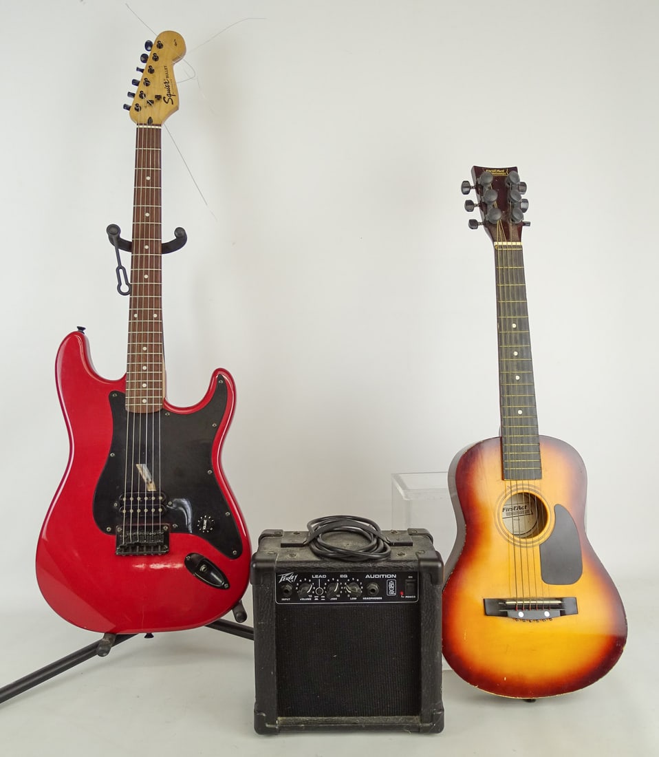 Guitar and Amplifier Lot: Lot including: Peavey Audition mini practice amplifier (works, 9" x 5" x 9"), "First Act Discovery" mini acoustic guitar (31" L.), Squier Bullet by Fender electric guitar (39" L.), comes with soft