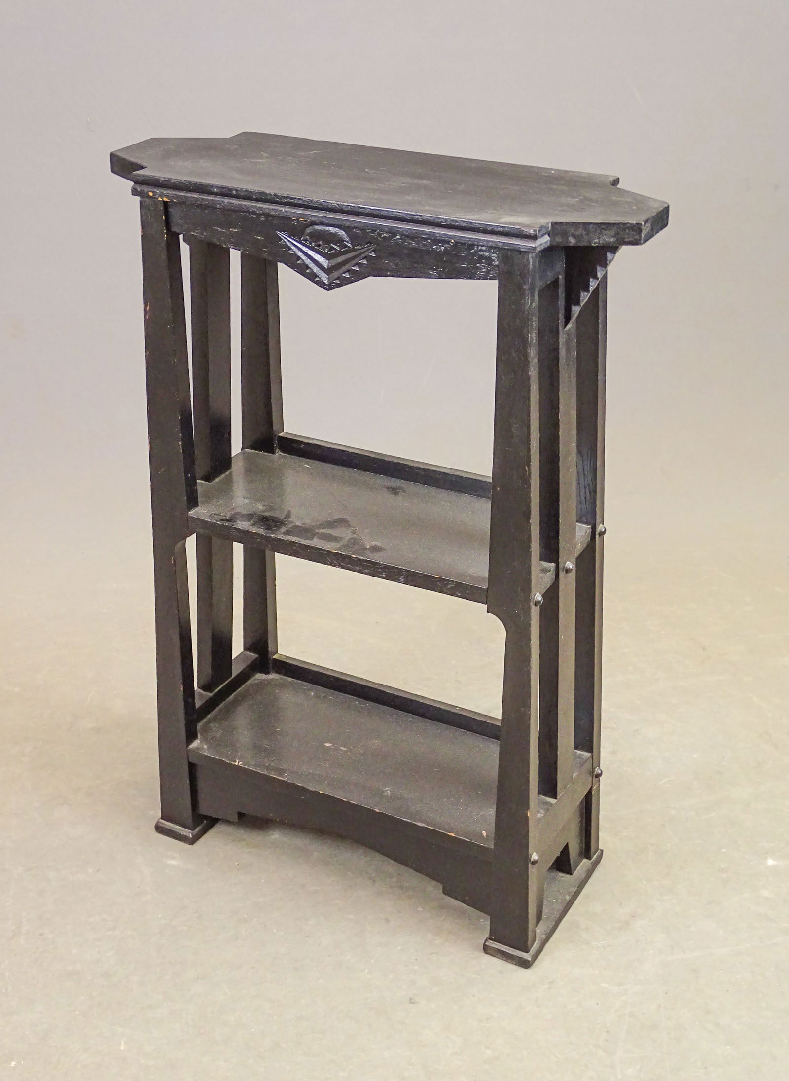 Arts & Crafts Bookshelf: Arts & Crafts period ebonized bookshelf. Signed. 22" x 8" x 30 1/2" Ht..