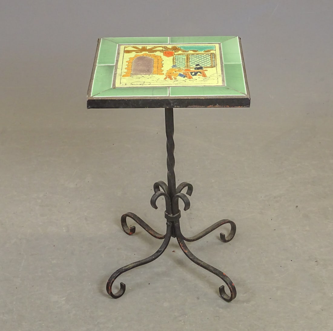 Tile Top Table: Tile top wrought iron base table attributed to Talor Tilery of Cecil Alden. Follow Field Hunt Series. 12" x 12" x 19 1/2".