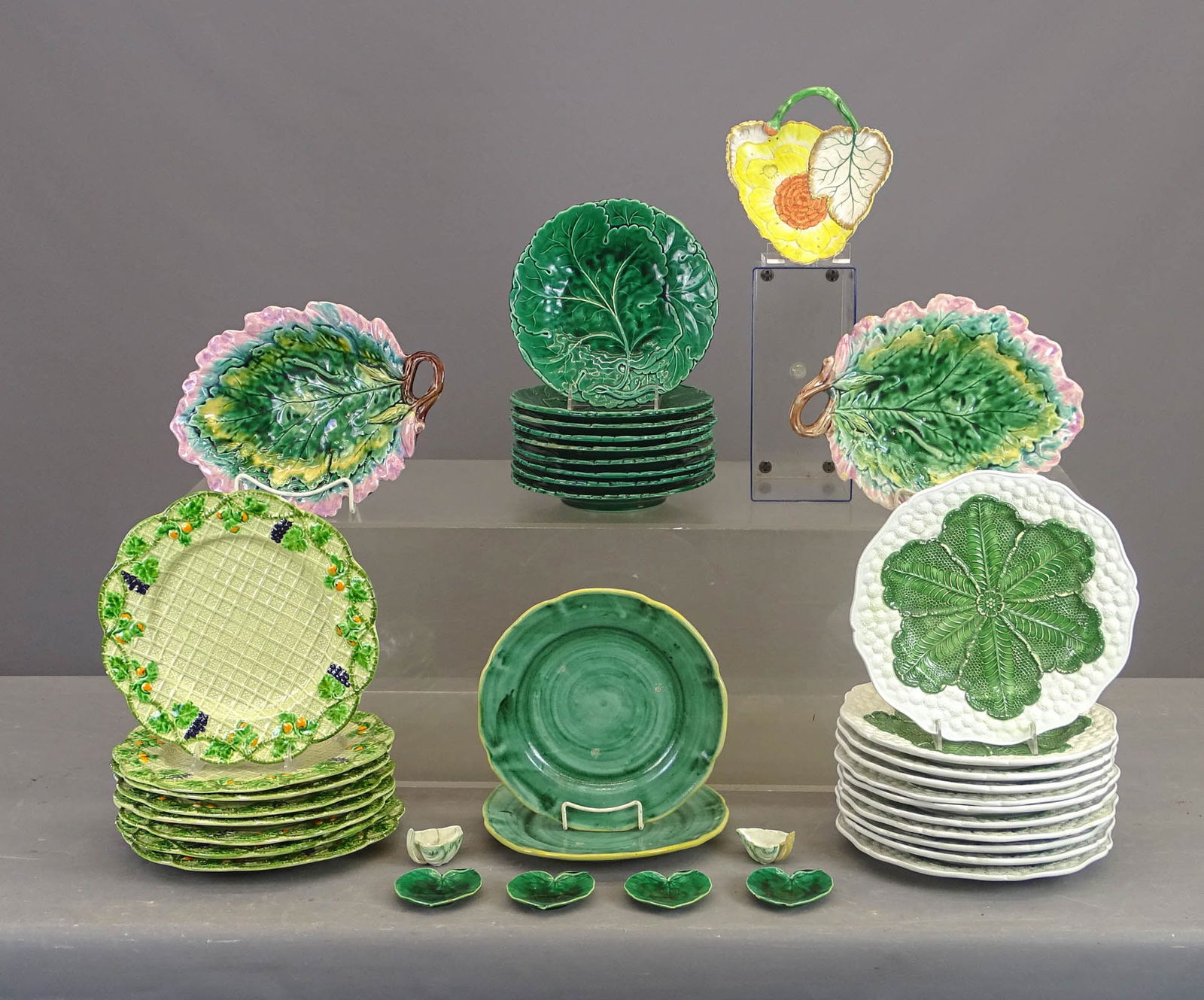 Majolica Lot: Majolica and Majolica style lot including: (9) cabbage leaf plates (9" D.), (8) Garden Berry stile Italian plates (11 1/3" D.), (11) Mottahedeh style Italian cauliflower leaf platters (12" L.), (4)