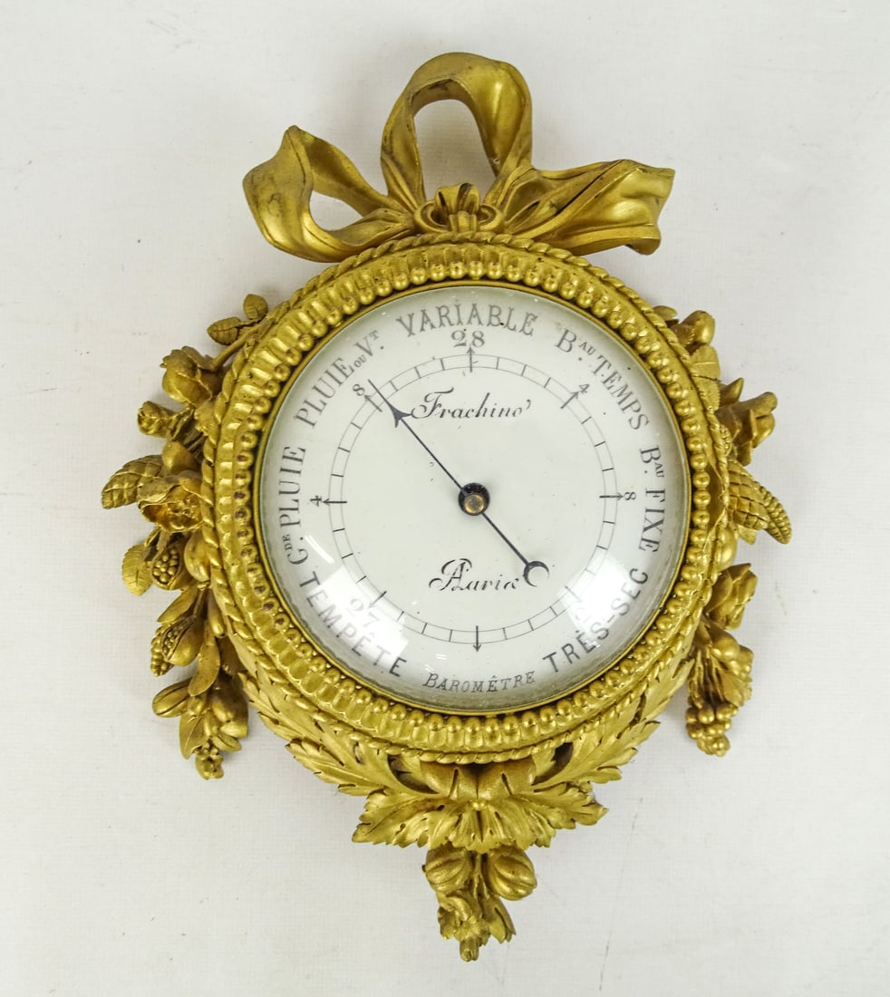 Cast Metal French Barometer: Cast metal French barometer signed "Franchino Paris". 9" x 7".