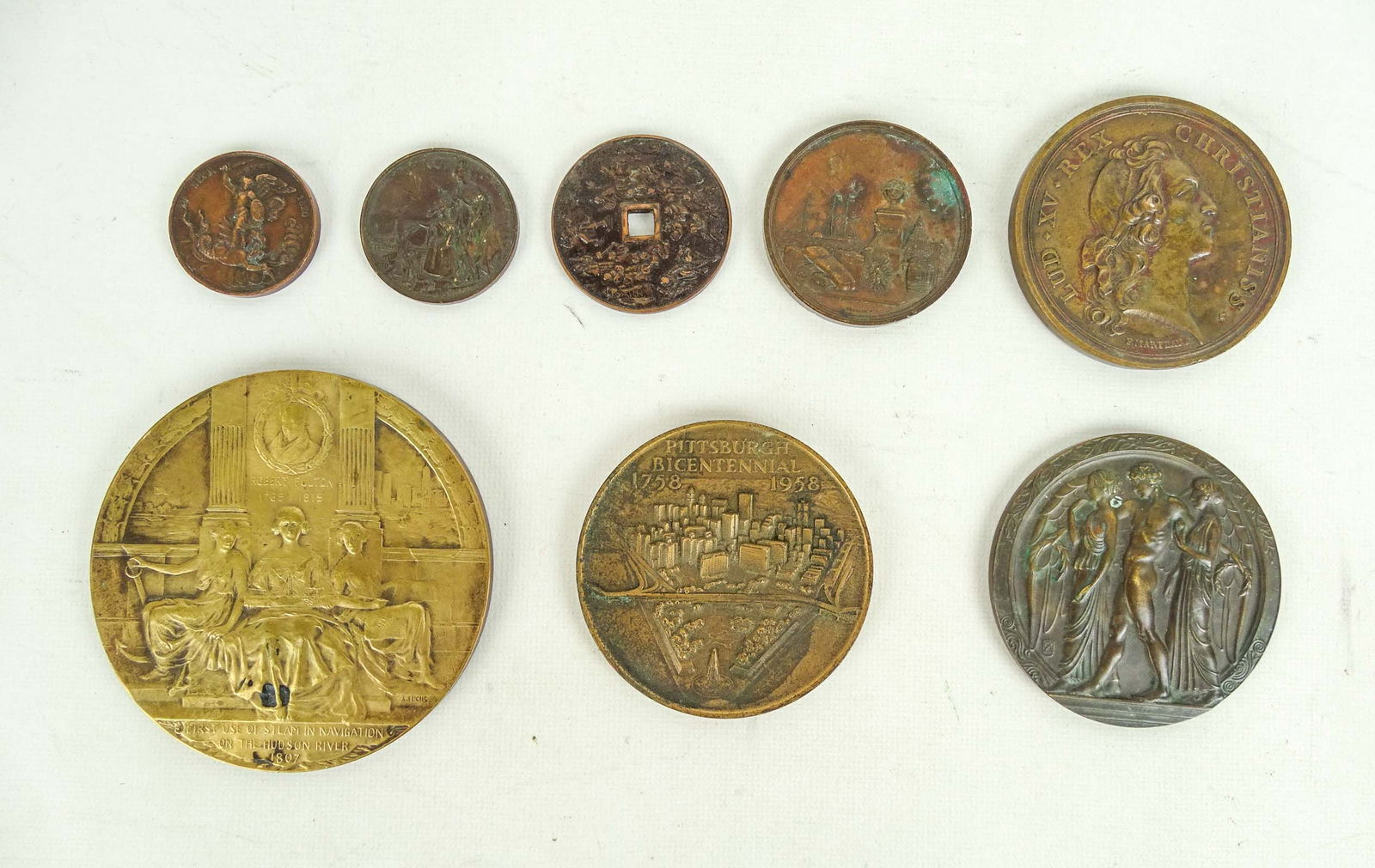 Medallions Lot: Lot of misc. medallions. Including: Robert Fulton 1765-1815, Pittsburgh Bicentennial 1758-1958, The Art Institue of Chicago 1921, Asian coin, Lud XV Rex Christianiss, La Societe Industriells.