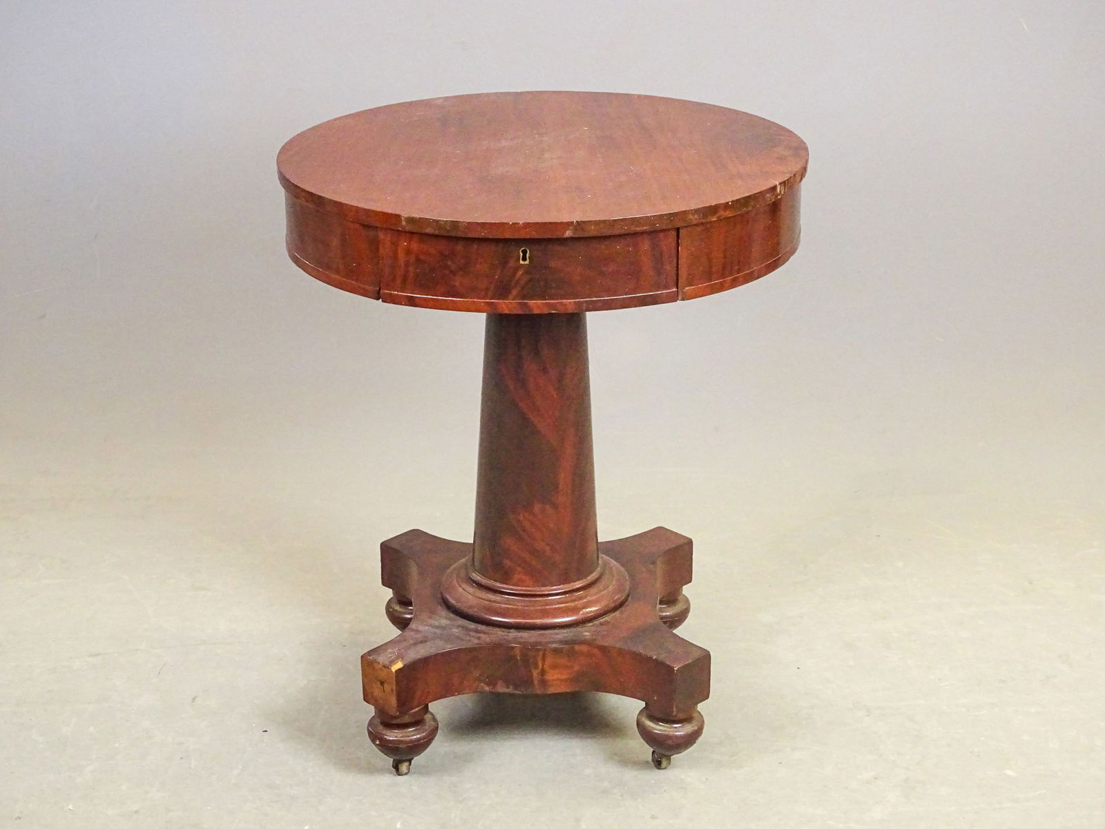 19th c. Empire Mahogany Drum Table: 19th c. Empire mahogany Drum table. 23" D., 28" Ht..