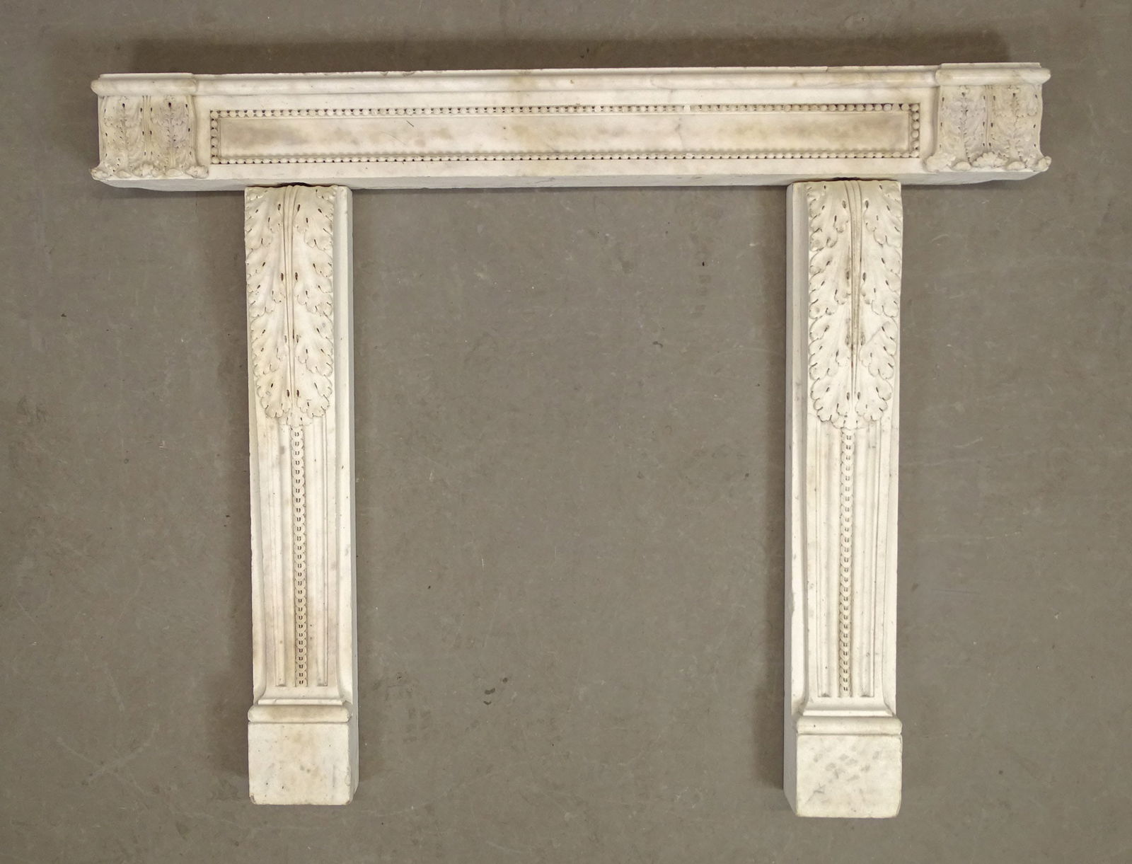 19th c. Carved Marble Fireplace Mantel: Three piece 19th c. carved marble fireplace. Sides 32 1/2" L,, center 47" L..