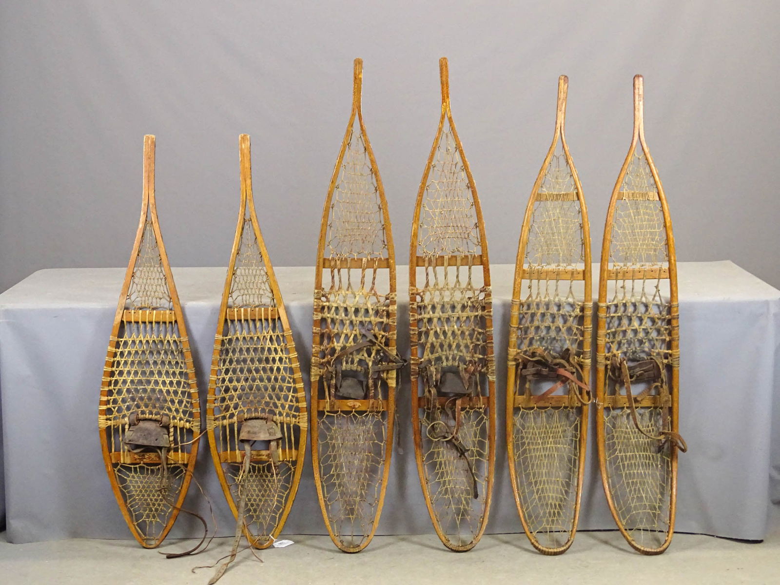 Three Pair of Early Snowshoes: Lot (3) pair of early snowshoes. 48" L., 55" and 57" L..