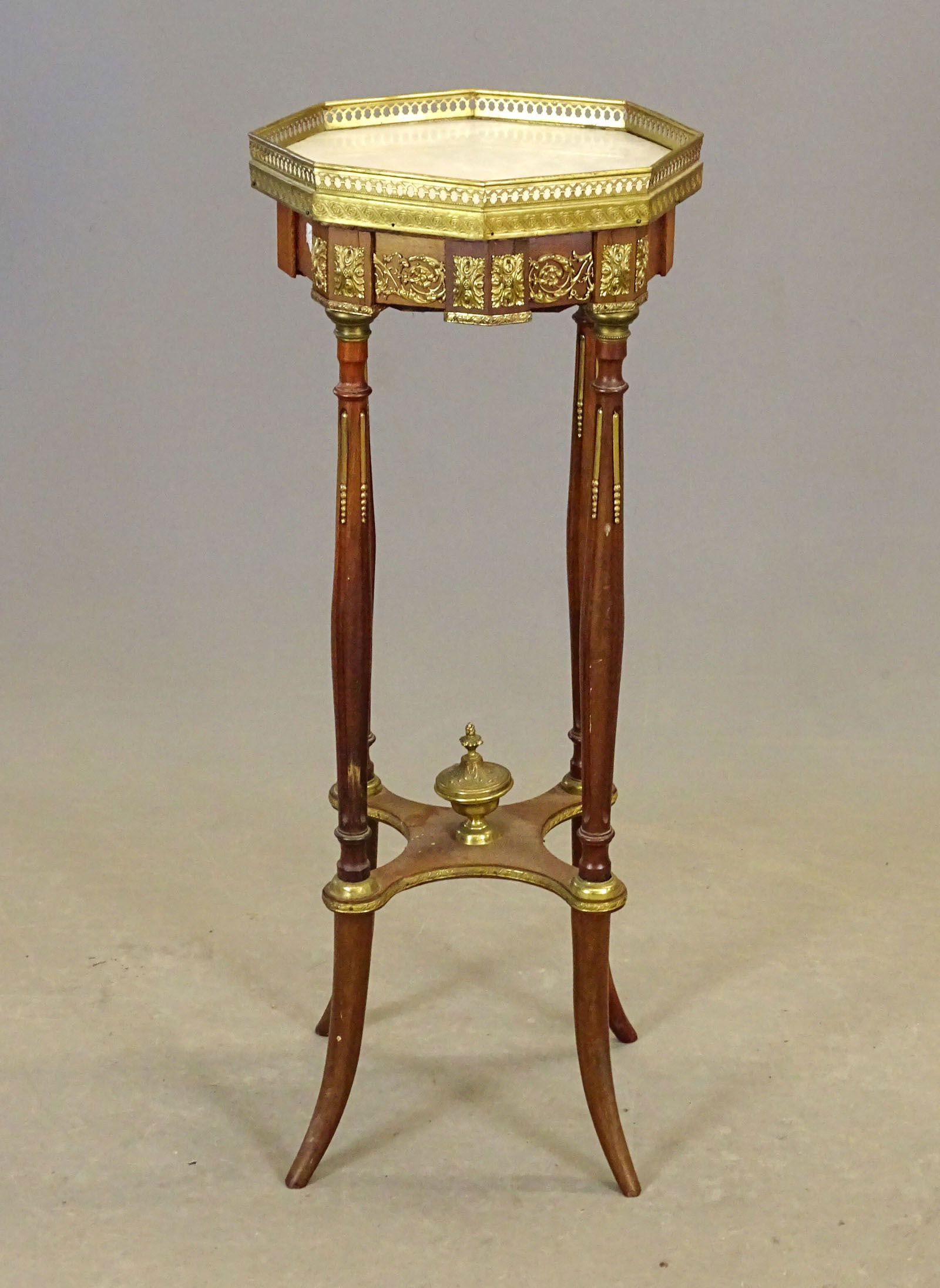 French Style Stand: French style octagonal brass mounted stand. 12" D., 32" Ht..