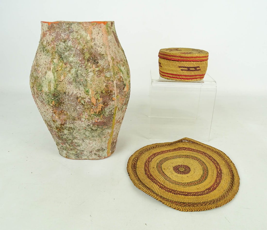 Southwest Basket Lot: Lot including Southwest lidded basket (3 1/2" D., 2" Ht.), and mat (7 1/2" D.), and redware pottery vessel (9 1/2" Ht.).