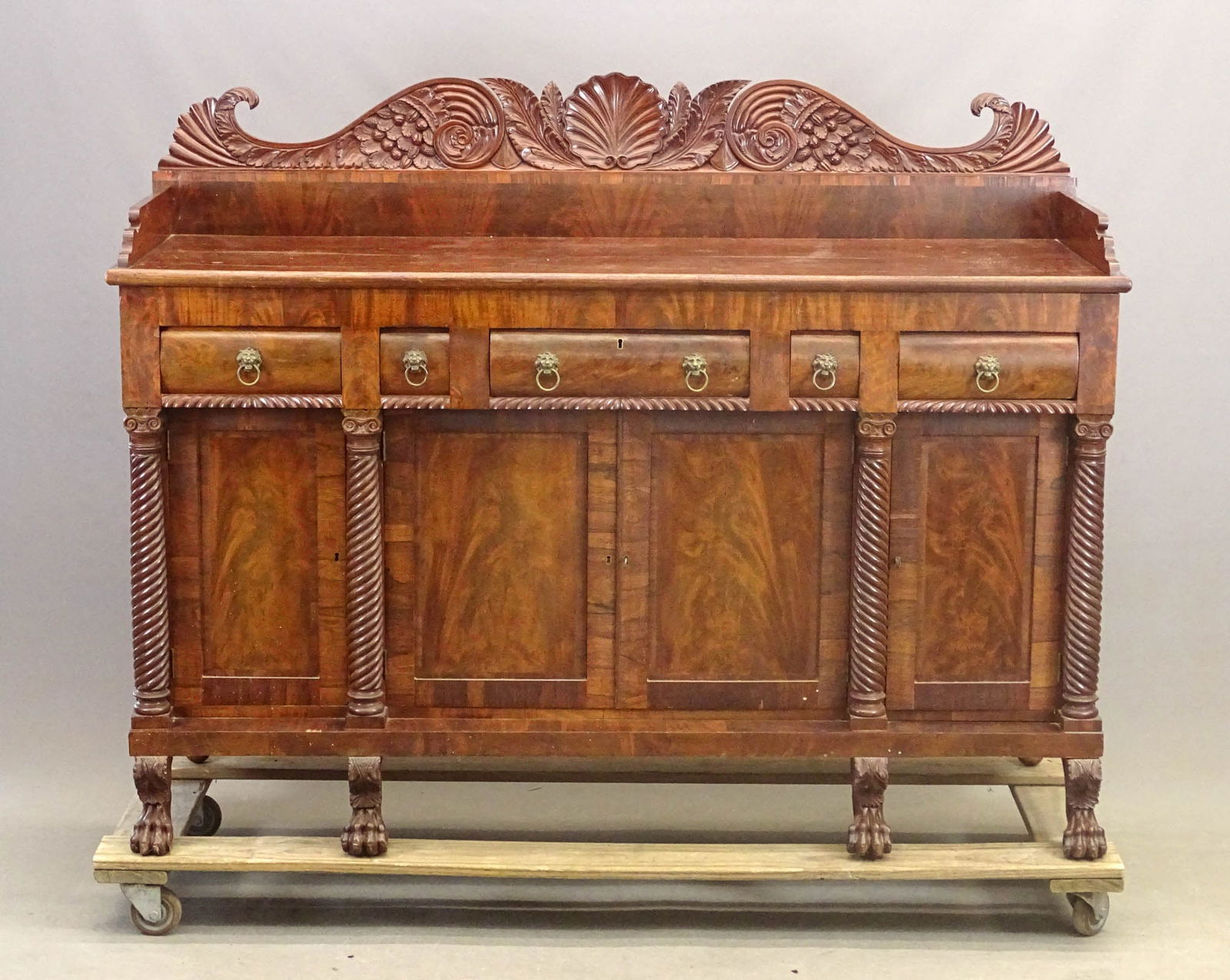 19th c. Empire Sideboard: Large 19th c. Empire carved sideboard. Probably Albany New York. 74" x 24" x 47" Ht..