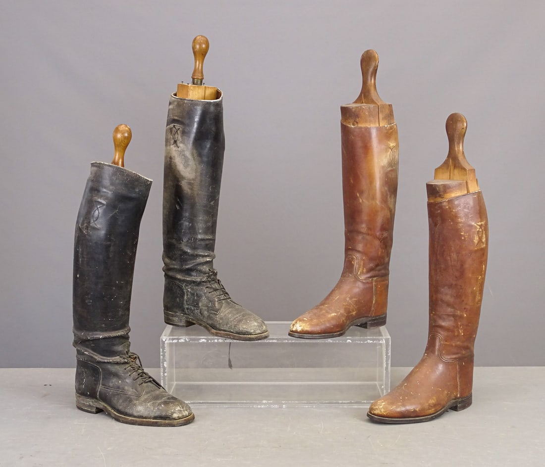 Boot Stretchers with Boots: Two pair of boot stretchers with boots. 24" overall Ht..