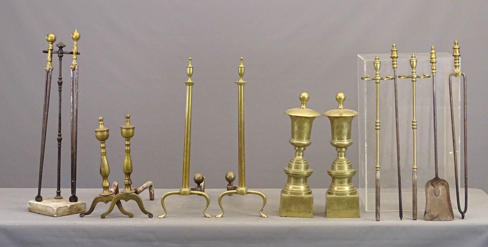 Fireplace Lot: Fireplace lot including: Pair of heavy brass Chenets (21 1/2" Ht.),two pair brass steeple top andirons (18" Ht., 16" D. and 27" Ht., 20" D.), firetool set (tallest 30" L.).
