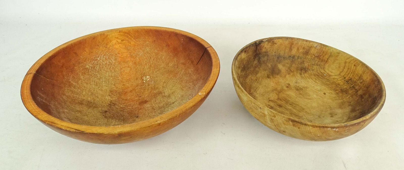 Wooden Bowls: Two vintage wooden bowls. 10 1/2" and 13" D..