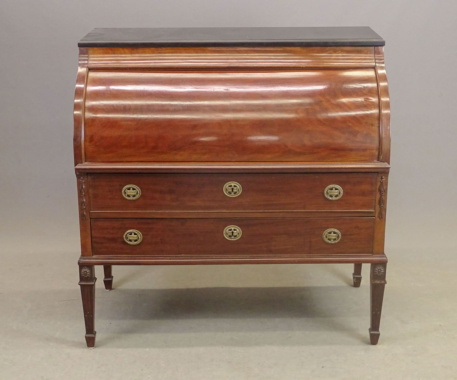 Continental Cylinder Desk: Early Continental Cylinder desk with black marble top. 44" x 23" x 45" Ht..