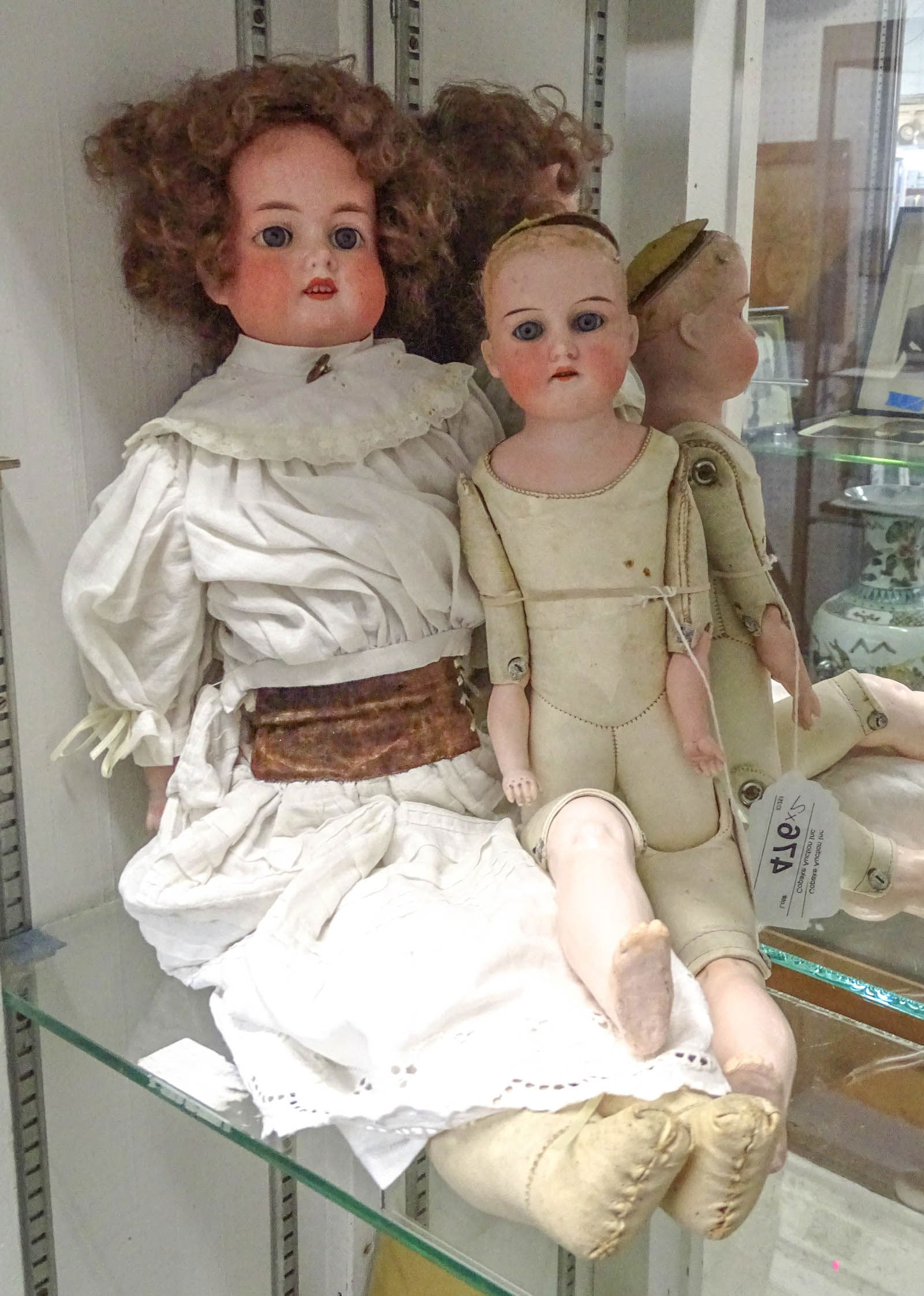Doll Lot: Lot (2) Antique porcelain including: Both signed Armand Marseille "370 Am-20 Dept." (17" L. and 24" L.).