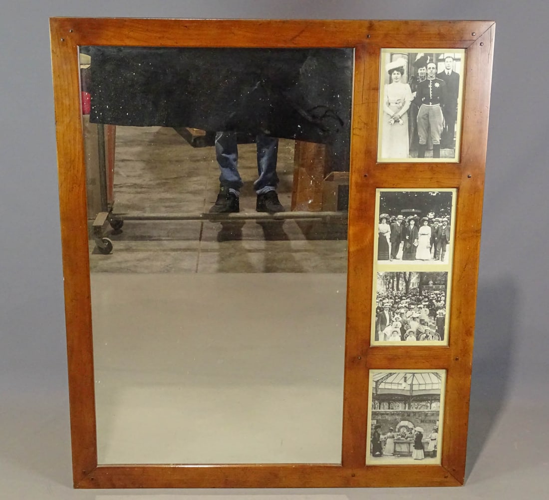 Large Wall Mirror: Large wall mirror. Prints mounted on side of mirror in a series of black and white historical type photographs. 51 1/2" x 43".