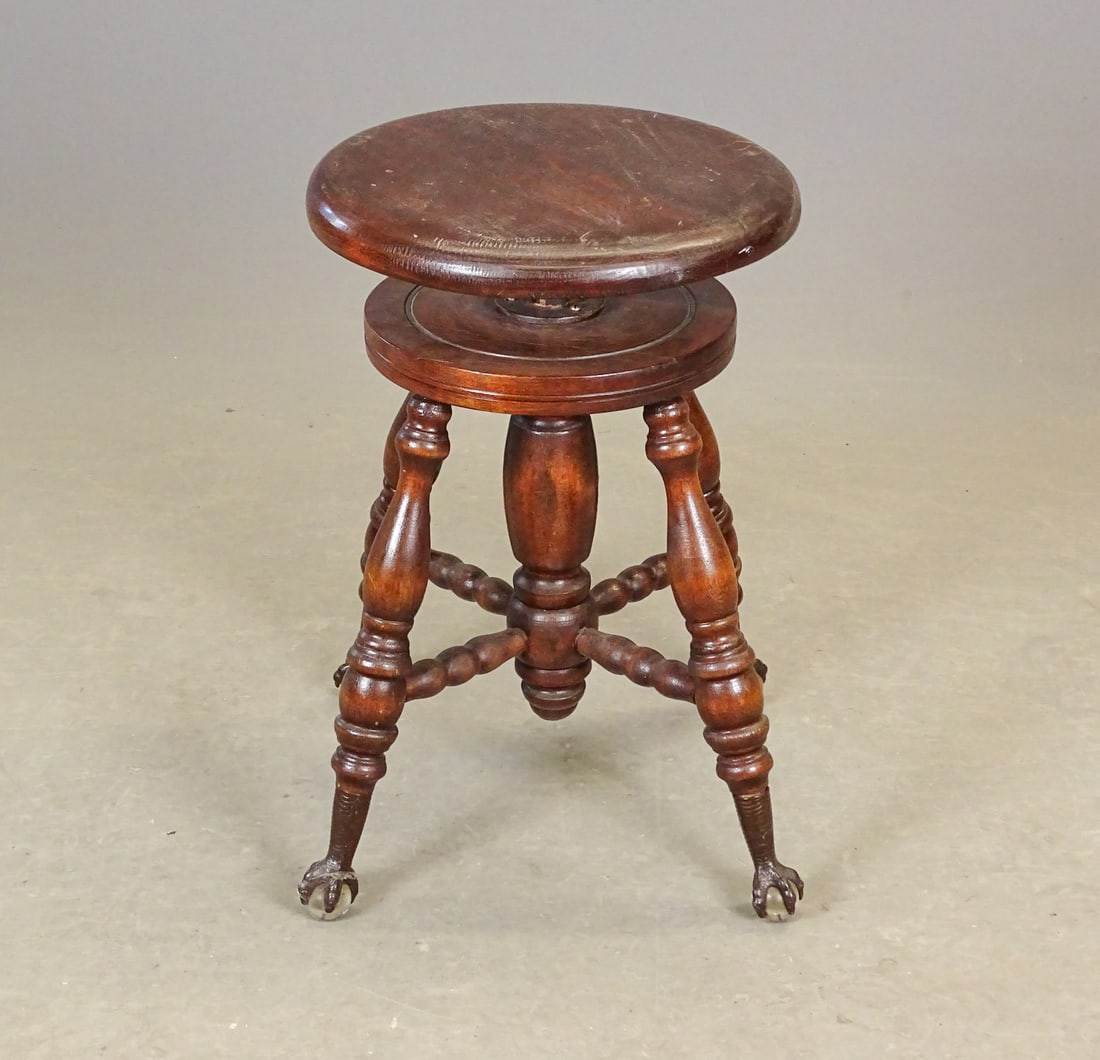 Victorian Revolving Piano Stool: Victorian revolving piano stool. 12" D., 19" Ht..