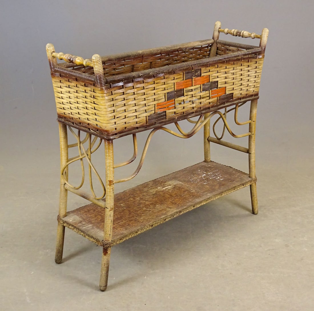 Wicker Planter: C. 1920's Wicker planter. 31" x 10" x 30" Ht..