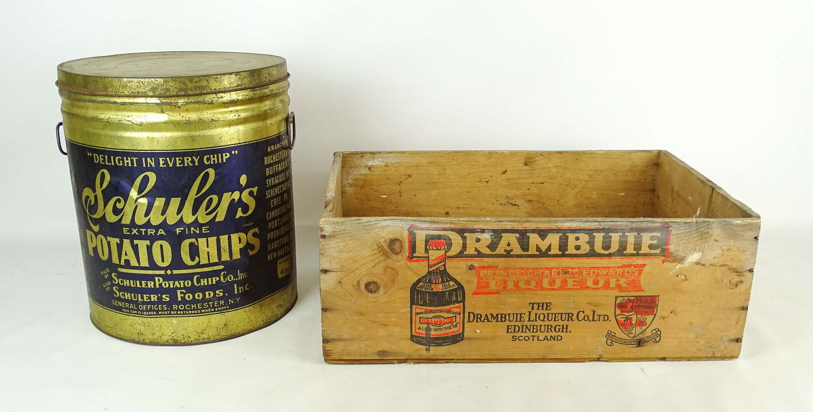 Tin and Crate Lot: Lot including Schuler's Potato Chips tin (12" D., 14 1/2" Ht.), and RAMBUIE crate (22" x 14 1/2" x 8" Ht..
