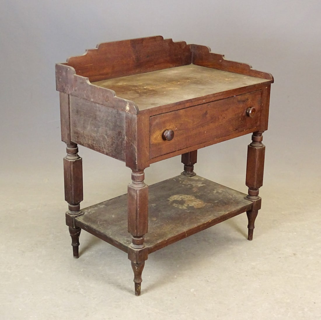 19th c. Work Stand: 19th c. work stand, having shaped surround splash back and single drawer with carved New York legs. 29 1/2" x 18 1/2", 6" splash Ht, 28 1/2" deck Ht.