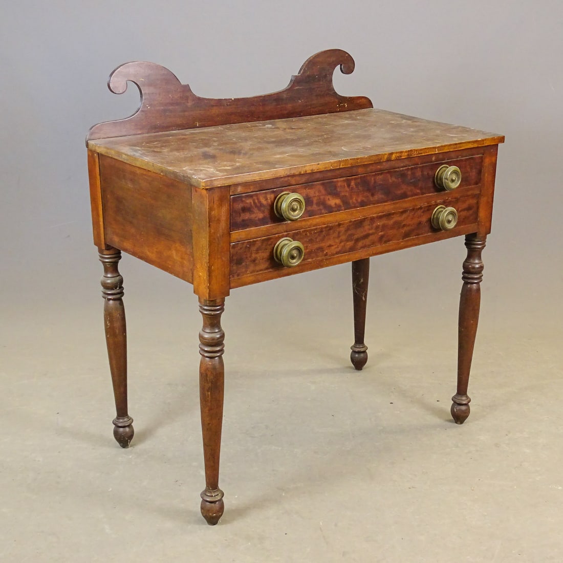 19th c. Two Drawer Work Table: 19th c. Sheraton 2 drawer work table, having splash back. 32" x 18", 6 1/4" splash back, 28 3/4" deck Ht.