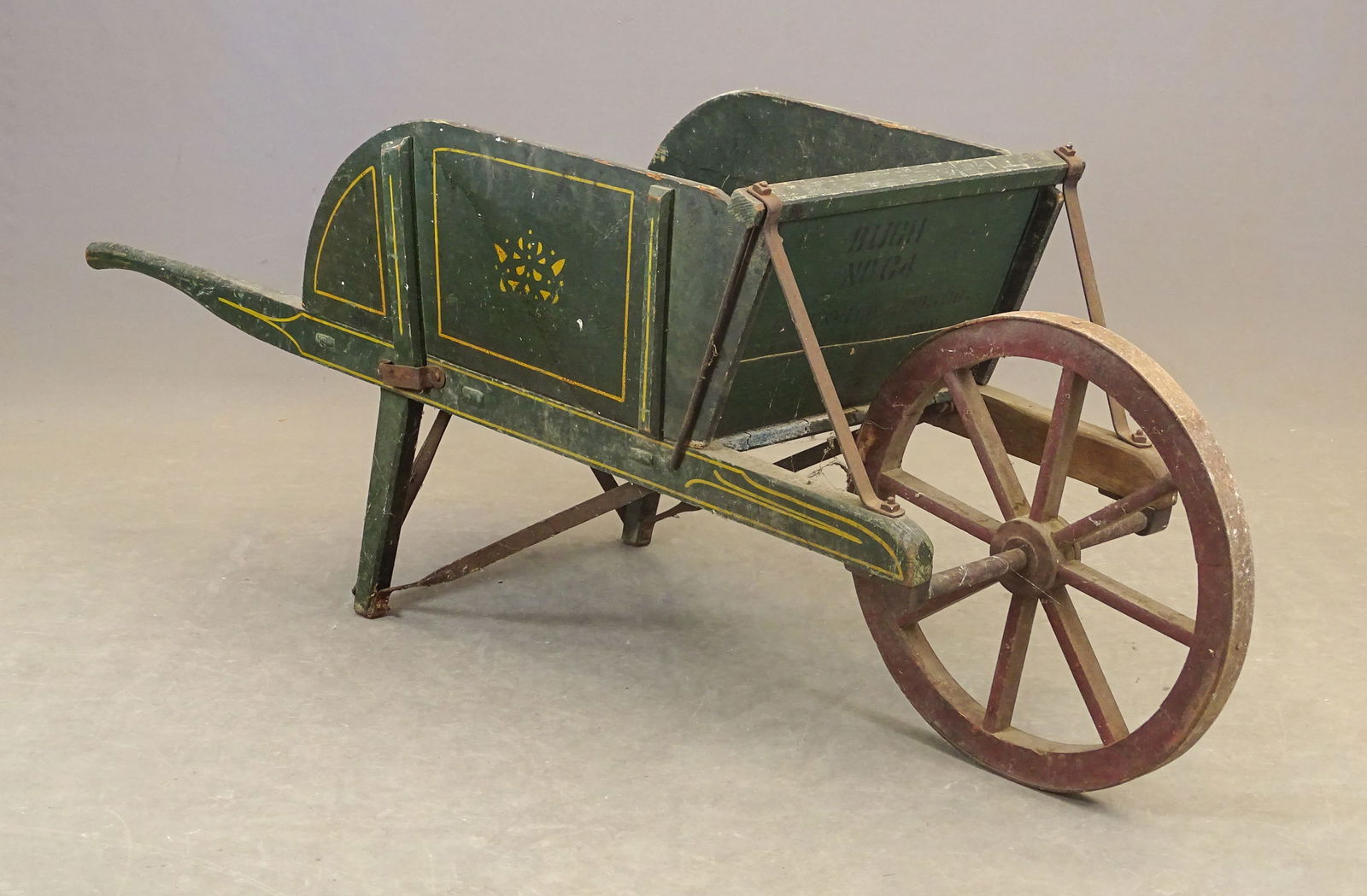Early Painted Wheelbarrow: Early paint decorated wheelbarrow. 72" x 22", 27" Ht.