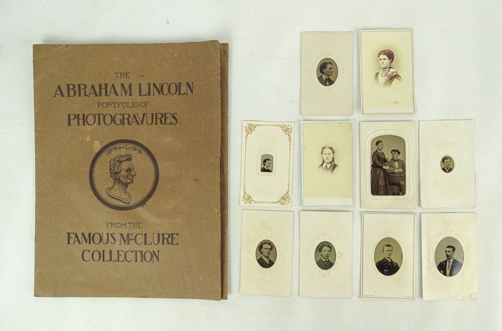 Early Photography Lot: Early Phtography lot, including: (8) Tintype portraits, (2) CDV, and "Abraham Lincoln Portfolio of Photogravures".