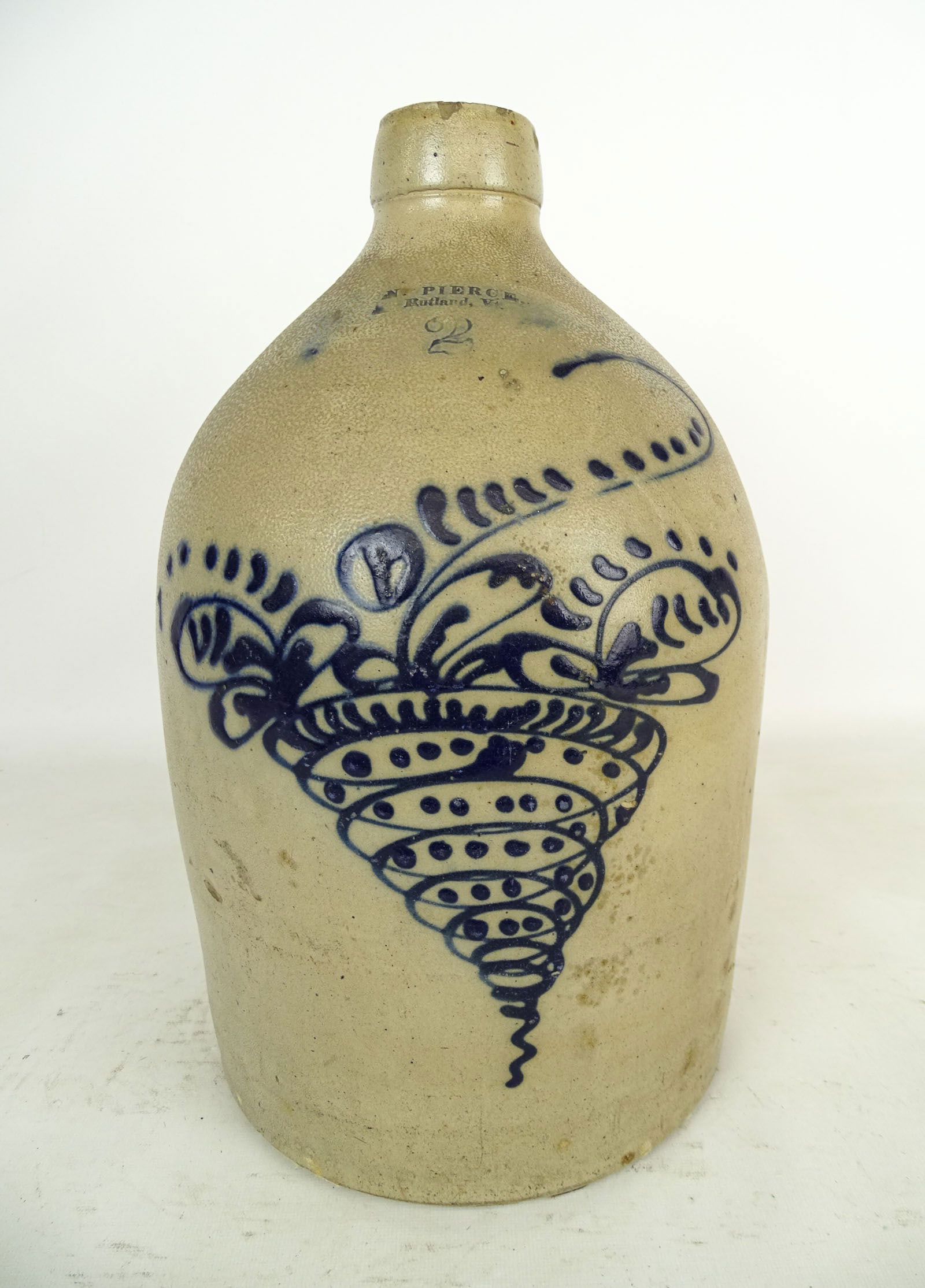 Stoneware Jug: Stoneware 2 gallon jug: "N. Pierce Rutland VT with swirl decoration", 14 1/4" Ht.