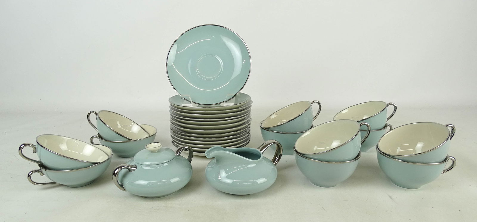 Franciscan MCM China: Franciscan "Dawn" MCM china including (8) cups and saucers, (4) cups and saucers, covered sugar and creamer and (2) saucers.