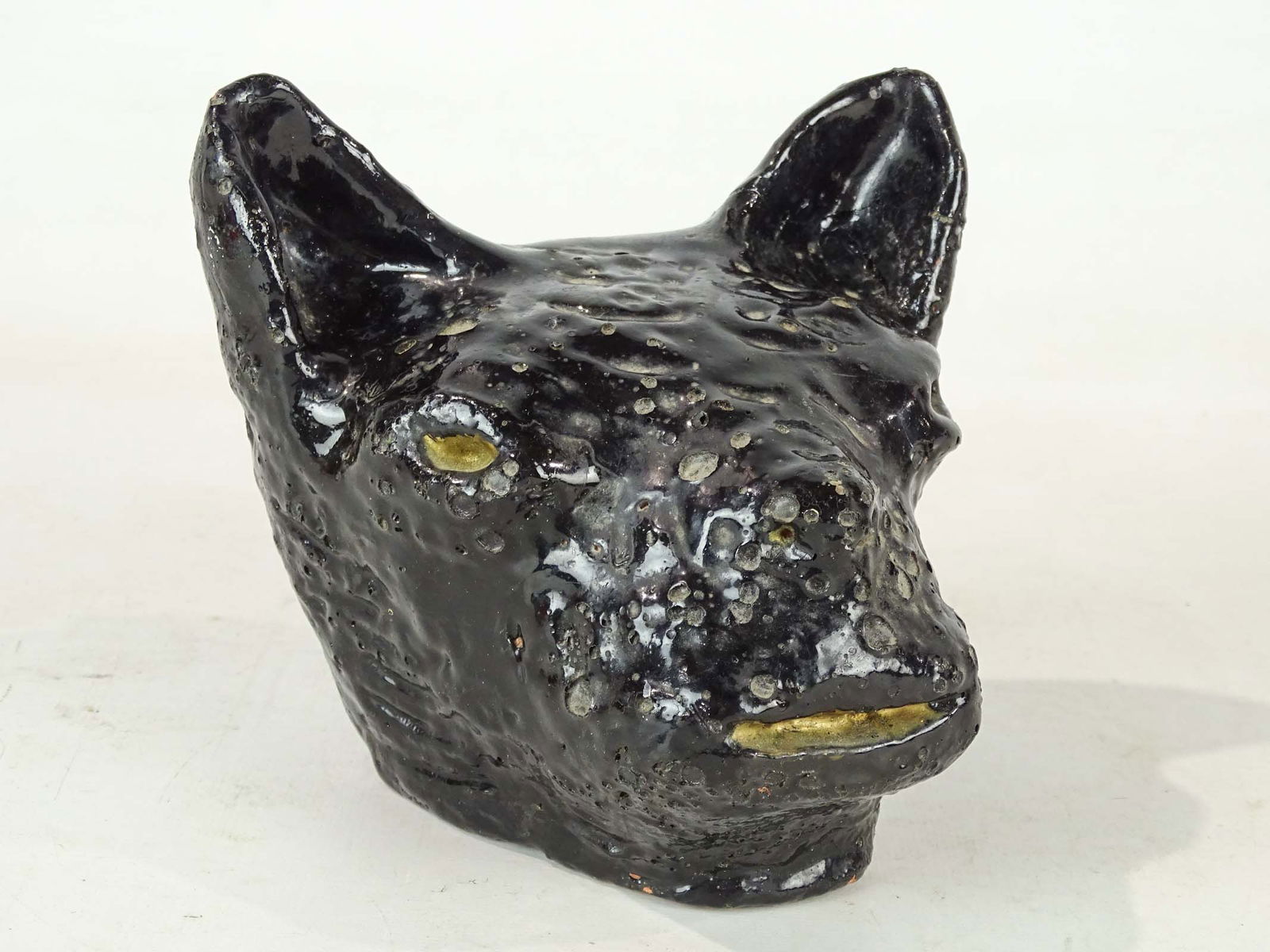 Black Cat Head Ceramic: Black cat head. Red clay American sewer tile pottery work. Occult, curiosity, oddity. 6" x 5" x 6" Ht..
