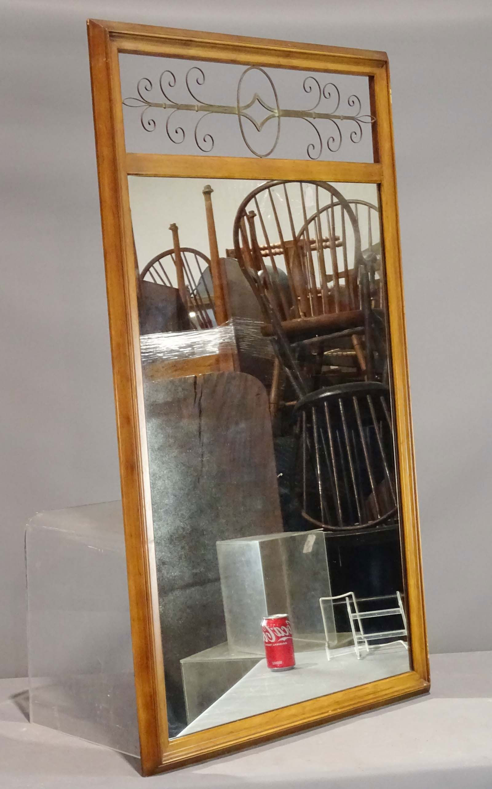 Widdicomb Mirror: Large mid century modern wall mirror. Wood with metal grill. Applied metal label: Made by John Widdicomb. Paper label: John Stuart Inc., Fourth Avenue at 32nd St., New York 16, N.Y. 50" x 29".