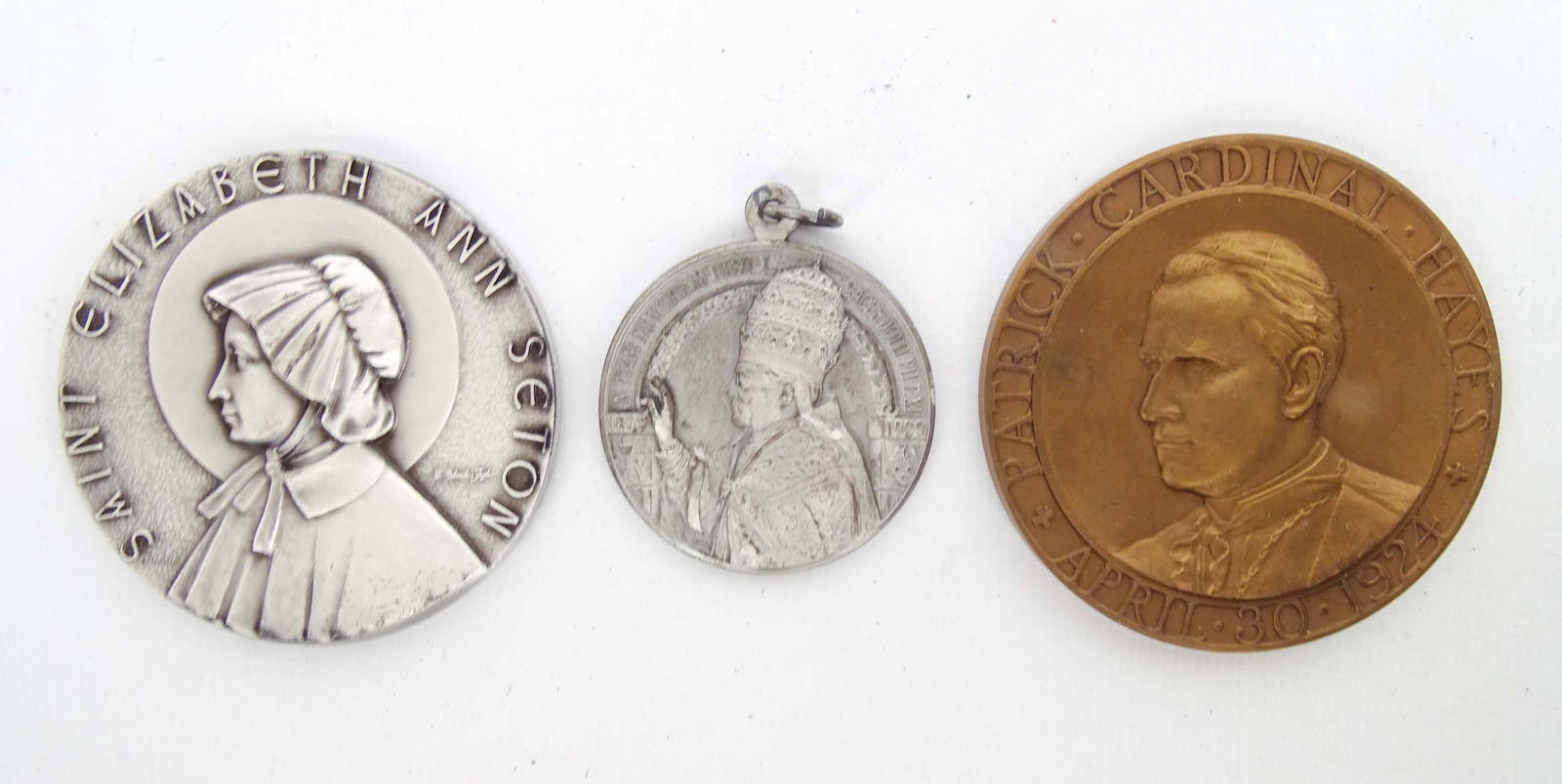 Collectible Religious Medals (3): Group 3 Exonumia medals. Pope Pius XI, 1929. Patrick Cardinal Hayes, 1924, by Tiffany & Co. Saint Elizabeth Ann Seton. Christian religion.